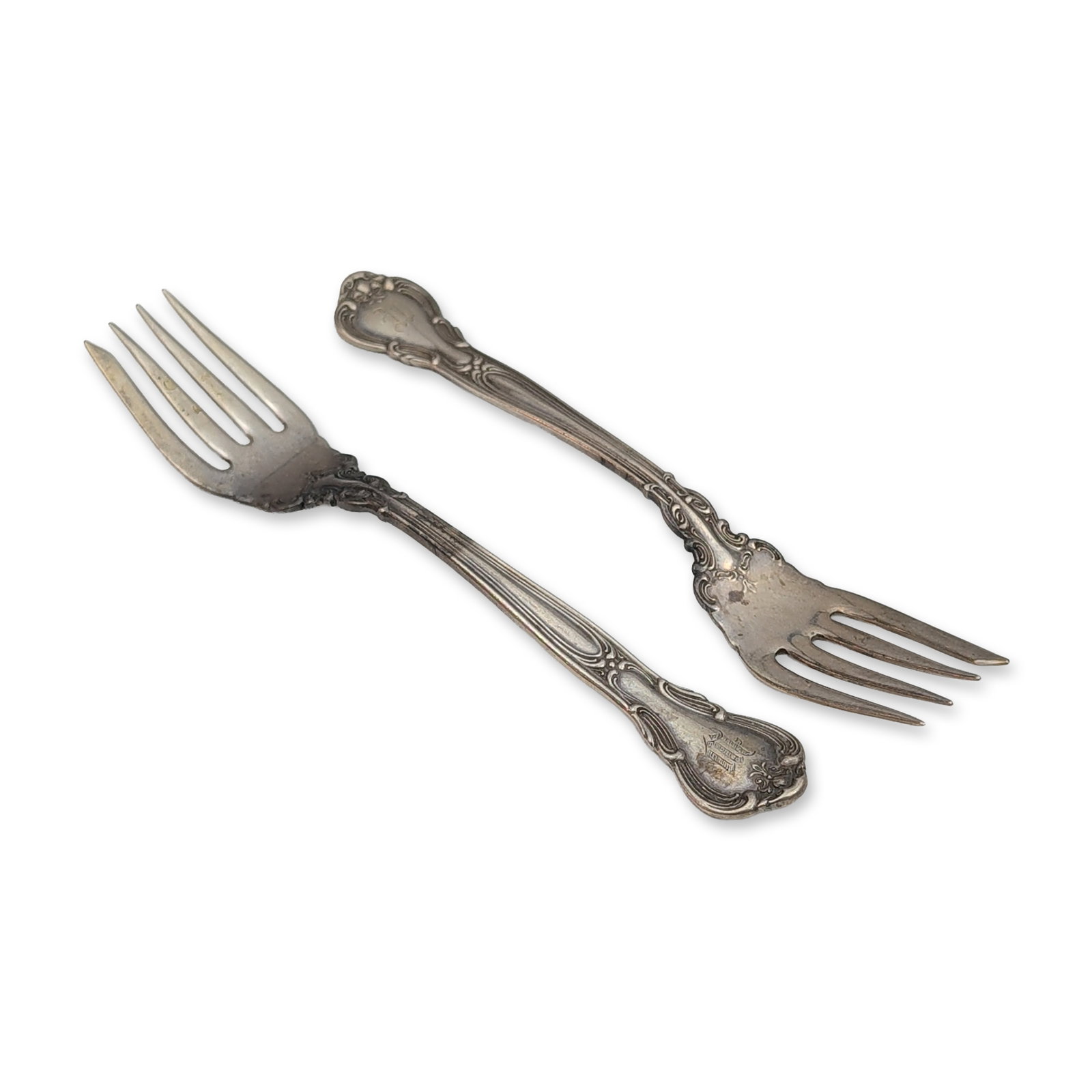 Gorham Sterling Silver Chantilly Salad Forks: Sterling silver forks in the Chantilly pattern, featuring a scrolled border and shell terminal. The tines exhibit a notched outer edge characteristic of pastry or fish forks. Each handle reverse is st