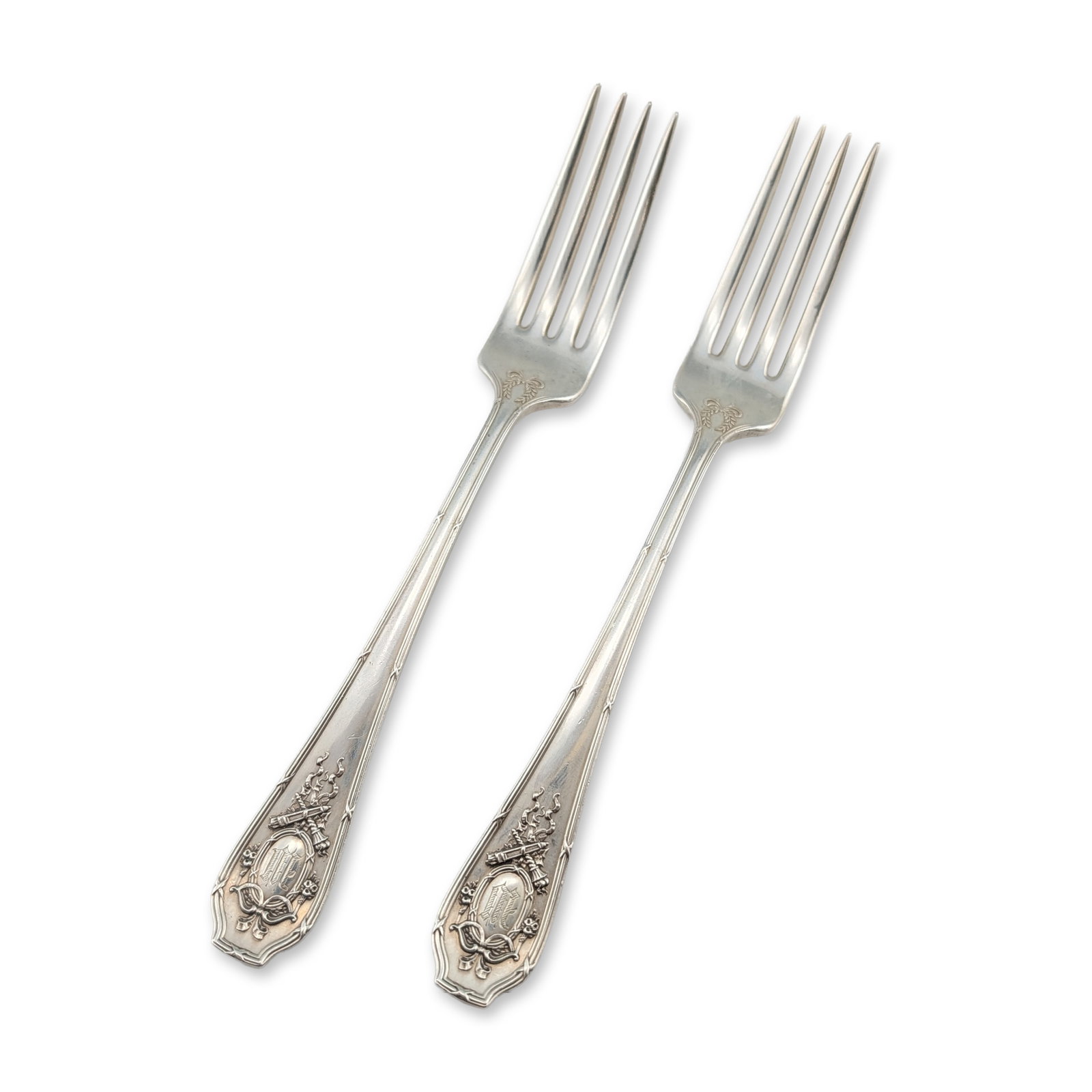 Pair of Wallace Sterling Silver Forks: R. Wallace & Sons. Pair of sterling silver forks featuring Neo-Classical handles with ribbon-tied oval cartouches, floral swags, and crossed torches. Reverse handles stamped with manufacturer marks R 