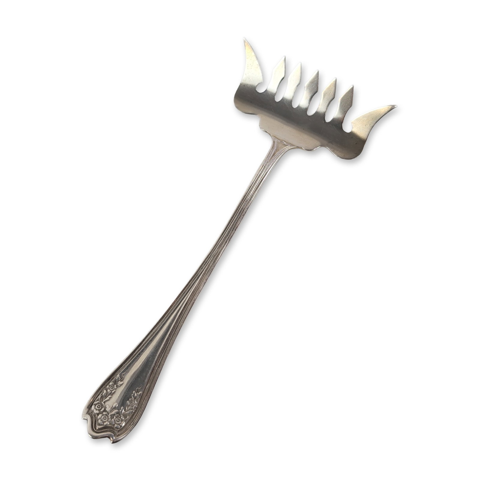 SSMC Sterling Silver Floral Sardine Fork: Sterling Silver Manufacturing Co. (Providence, Rhode Island). Sardine fork in solid sterling silver, featuring a wide serving head with seven curved tines. The handle is decorated with a detailed reli