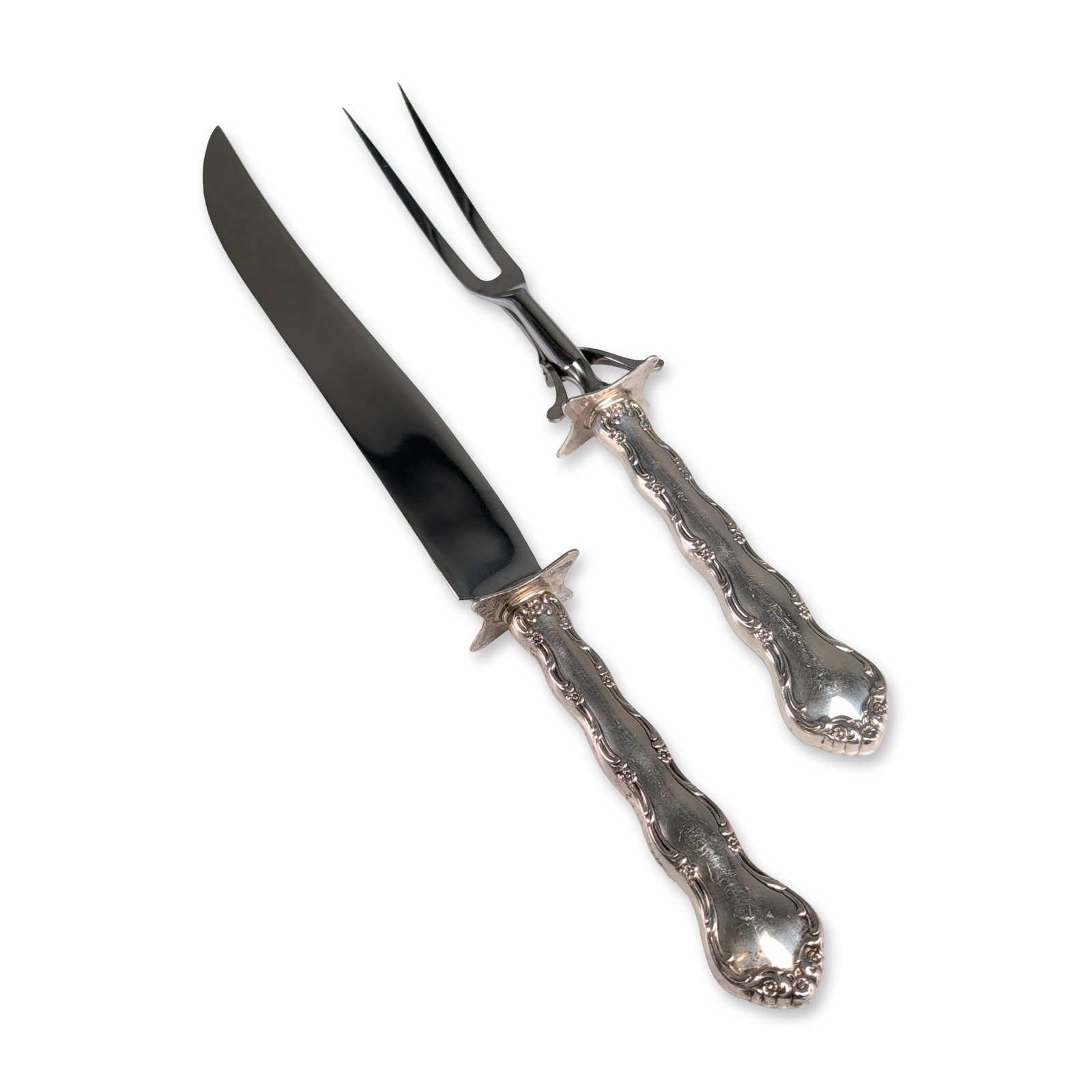 Reed and Barton Francis I Sterling Handle Carving Set: Reed and Barton, American, introduced 1907. Two-piece carving set in the Francis I pattern, featuring an ornate Rococo Revival design with clusters of fruit and scrolling foliage. The set consists of 