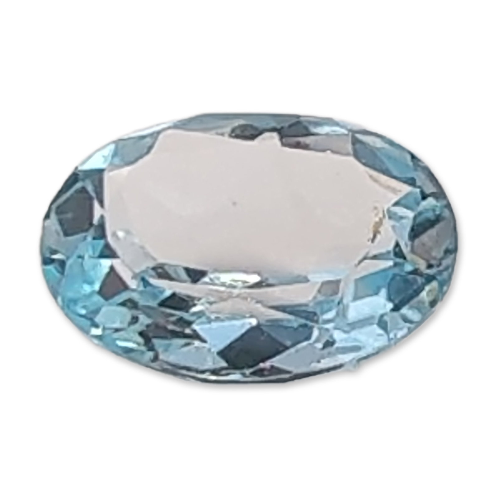 Sky Blue Oval Faceted Topaz Gemstone: Single loose faceted Topaz gemstone in a light sky blue hue. The stone is worked in an oval faceted cut featuring a brilliant-style pavilion and high transparency. Its color and clarity characteristic