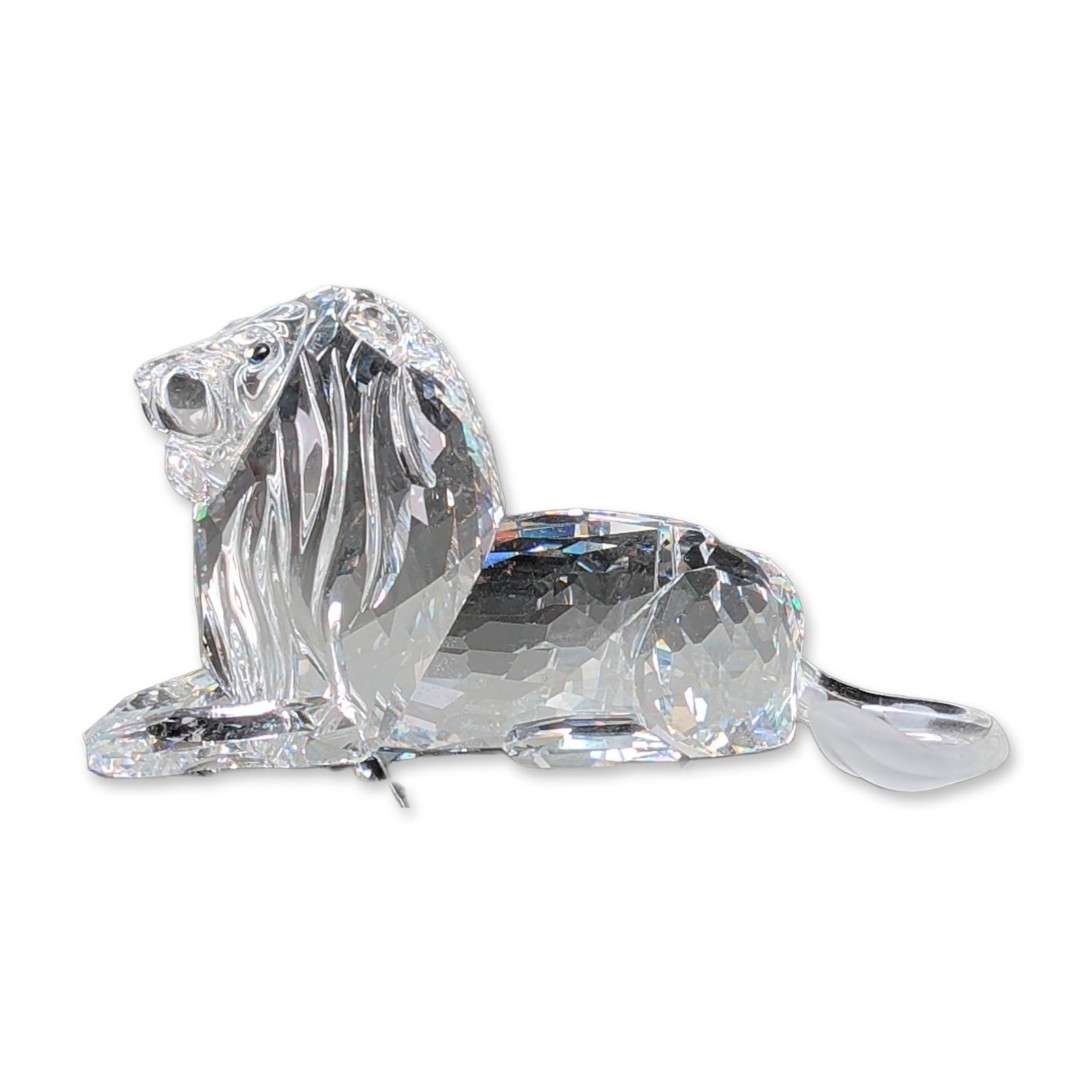 Swarovski Crystal SCS 1995 Annual Edition Figurine, Inspiration Africa The Lion: Swarovski. Faceted lead crystal lion figurine, 1995 Swarovski Crystal Society (SCS) Annual Edition from the Inspiration Africa trilogy. Designed by Adi Stocker, the piece features a full-cut faceted c