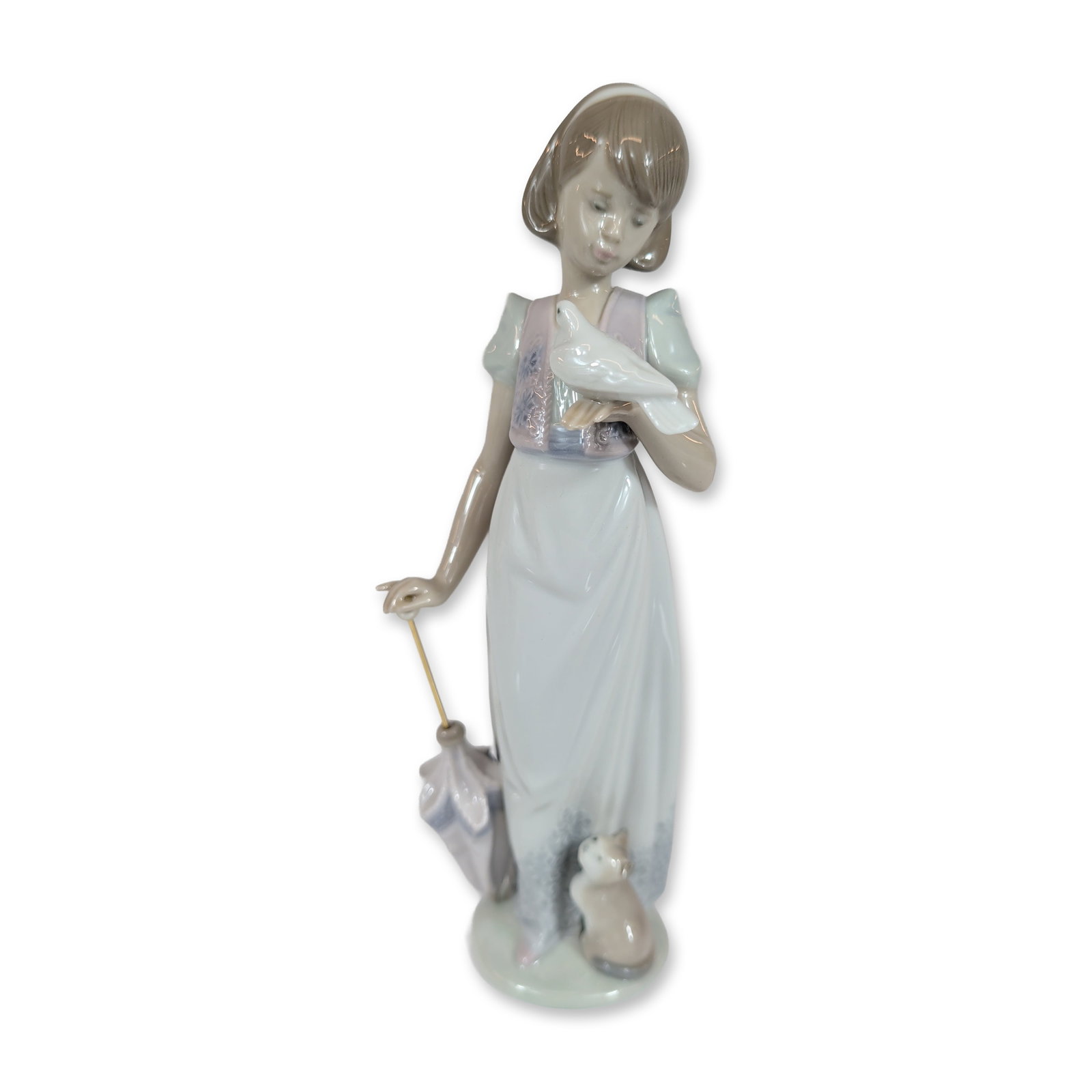 Lladro Summer Stroll 1991 Society Figurine: Lladro Summer Stroll (Paseo de Verano) glazed porcelain figurine, model number 7611. The piece depicts a young girl in a pale blue and lilac dress holding a white dove, with a kitten at her feet and a