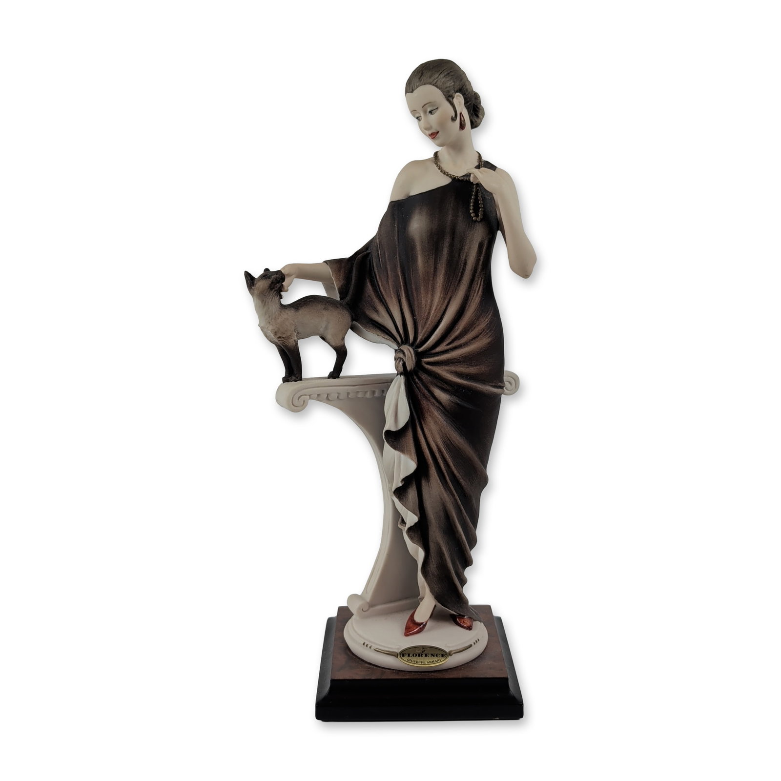Giuseppe Armani Florence Italian Danielle Cold Cast Porcelain Figurine: Giuseppe Armani for Florence Sculture d Arte. Cold-cast porcelain figurine titled Danielle, model 0436C, depicting a woman in an Art Deco style bronze-toned evening gown leaning over a pedestal to pet