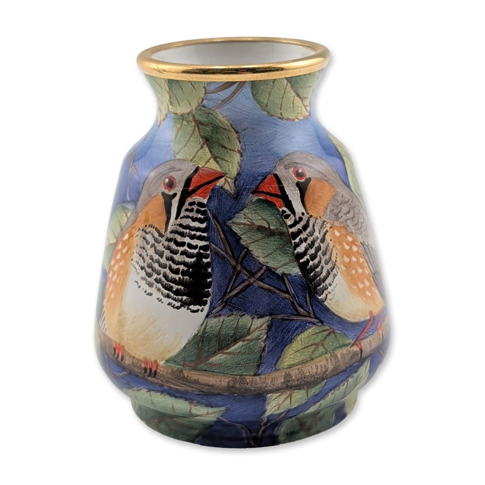 Moorcroft Enamels Miniature Limited Edition Vase, Zebra Finch: Hand-painted enamel design featuring two zebra finches perched on leafy branches against a cobalt blue ground, finished with a gold gilt rim. Underside marked with Moorcroft and Made in England stamps