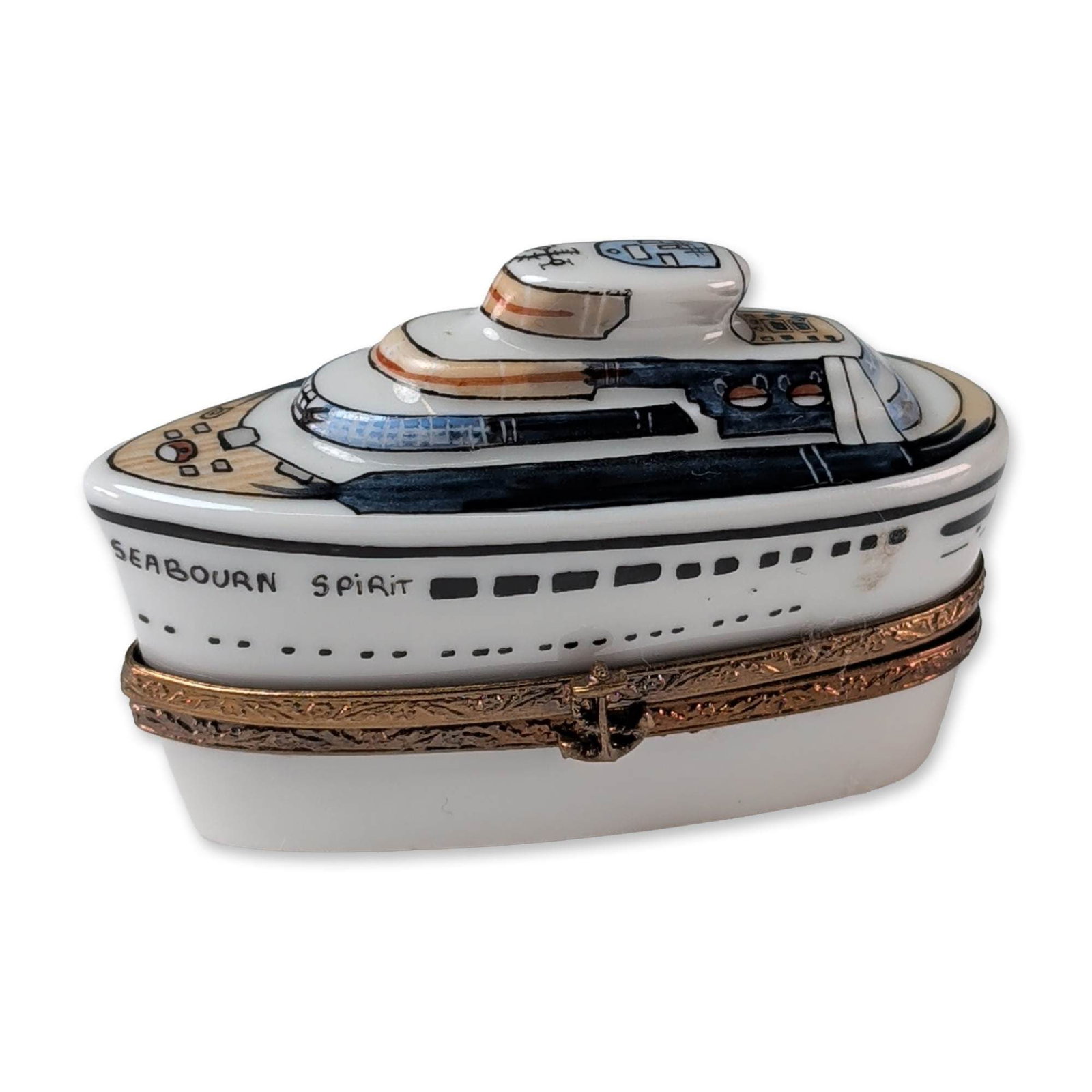 Limoges Seabourn Spirit Porcelain Trinket Box: French Limoges hand painted porcelain trinket box modeled as the Seabourn Spirit cruise ship. The lid features a detailed superstructure with the vessel name inscribed on the side. The interior base c