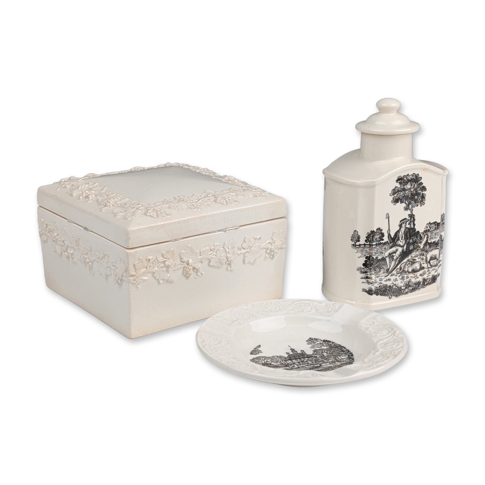 3pc Wedgwood Queen's Ware Tea Caddy, Box and Dish.: Trio of Wedgwood Queen's Ware earthenware pieces, including a hexagonal tea caddy, a square lidded box, and a circular dish. The hexagonal tea caddy features a black transfer-printed scene of an 18th-