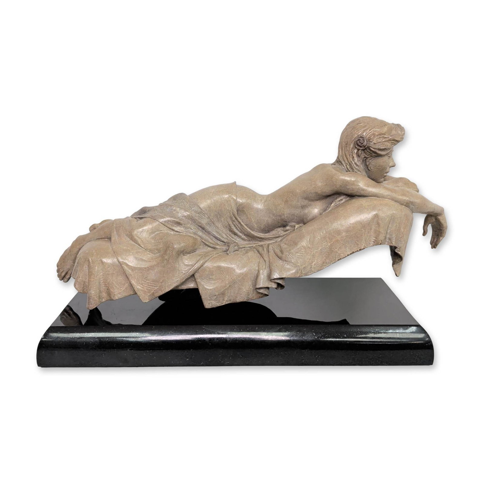 Martin Eichinger (American, b. 1949), Daydream: Martin Eichinger (American, b. 1949). Daydream mounted vignette in patinated cast bronze on a polished black stone slab. The figurative work features a partially draped female figure in a dynamic, sus