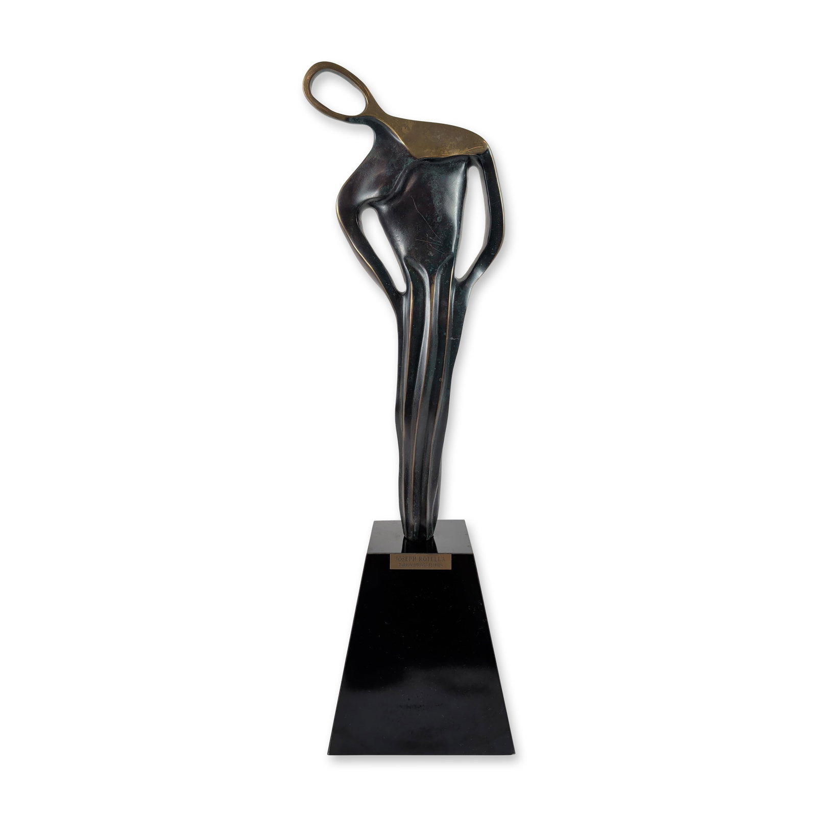 Joseph Rotella Bronze Abstract Figural Sculpture: Joseph Rotella (American, 20th century). Abstract figural sculpture in cast bronze, featuring a highly stylized and elongated form with a central void and a circular loop terminal. The work exhibits a