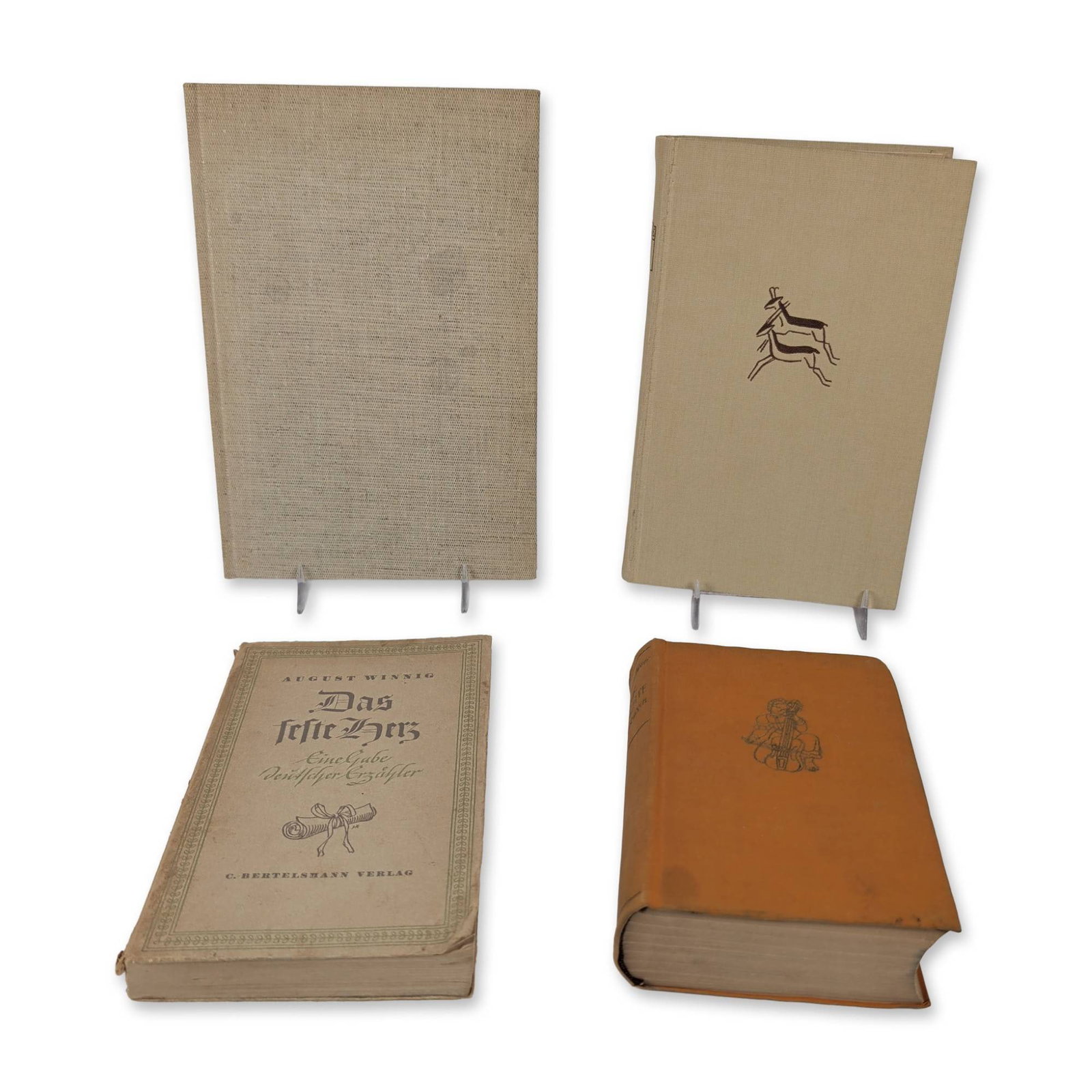 4 German Academic Hardcover Books: Collection of German-language hardcover volumes covering science, music history, and regional studies. The group includes Lorentz, Einstein, and Minkowski, bound in tan cloth; Hans Joachim Moser, Gesc