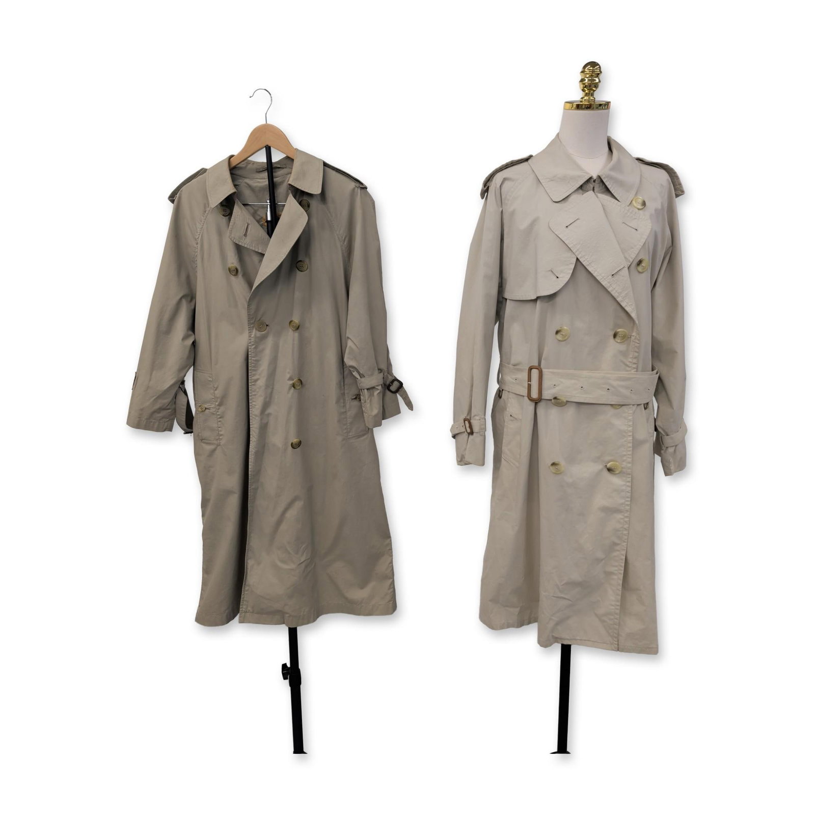 Two Burberrys Vintage Cotton Gabardine Trench Coats: Two vintage double-breasted trench coats by Burberrys, produced in England circa 1980s-1990s. Constructed from 100% cotton gabardine, the coats feature traditional details including shoulder