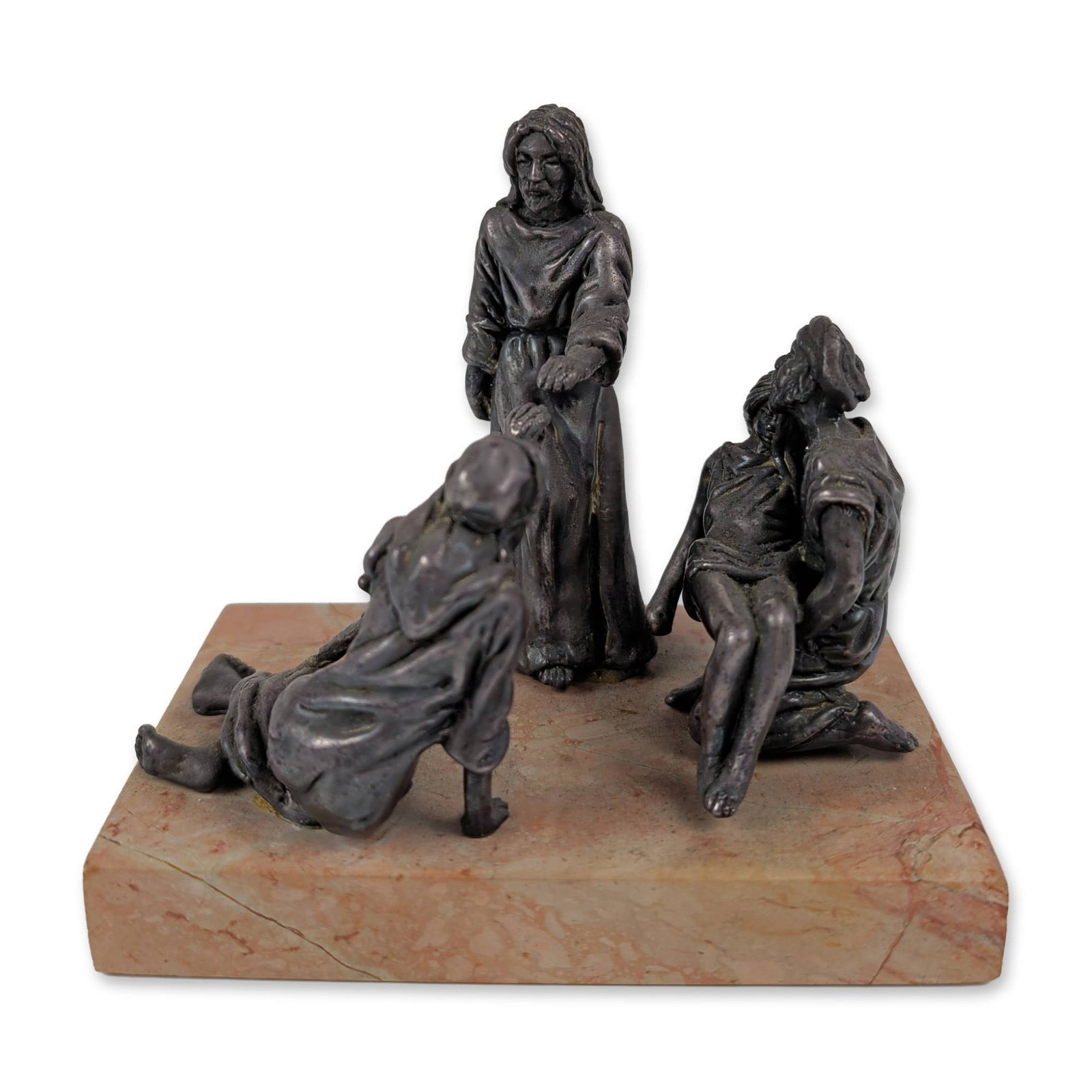 Sterling Silver Figurines on Marble Base, Jesus Healing the Sick: Sterling silver narrative sculpture by Yaacov Heller (Edition 3/8) depicting Jesus healing, mounted on a pink and tan mottled marble plinth. All figurines marked 925. Tested on Thermo-scientific analy