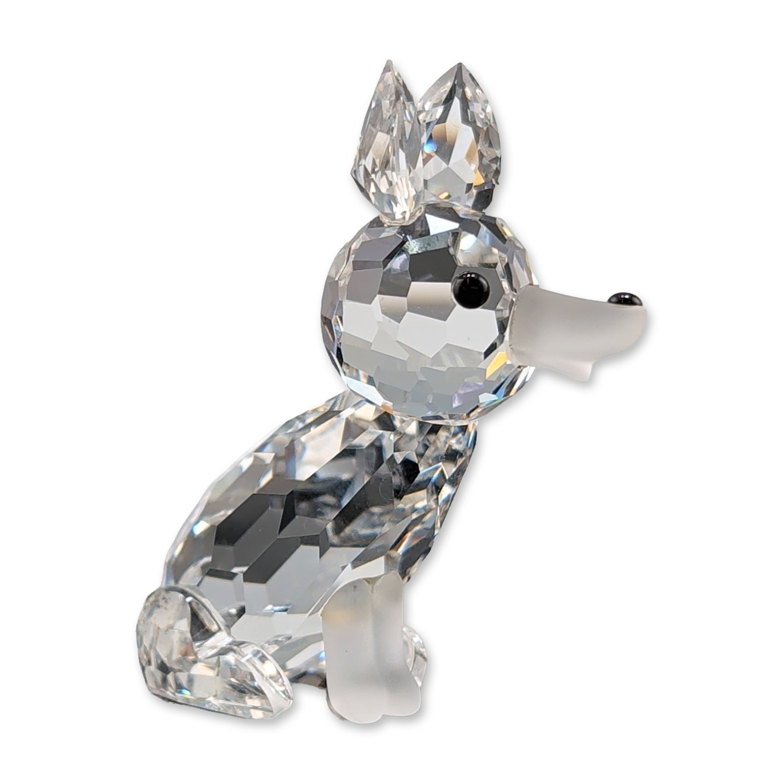 Swarovski Austrian Crystal Fox Figurine: Swarovski figurine in faceted and frosted lead crystal depicting a seated fox. The piece features a faceted clear crystal body and head with frosted accents on the snout, tail, and front legs. Feature