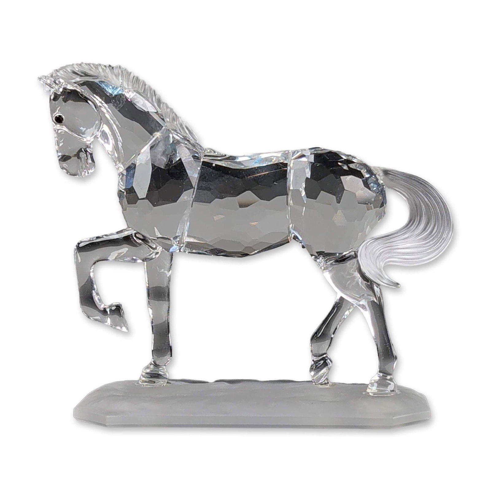 Swarovski Crystal Figurine, Arabian Stallion: The crystal figurines designed by Martin Zendron as part of the Horses on Parade. The figure in a dressage stance features a clear faceted crystal body with a textured mane and tail, mounted on a fros