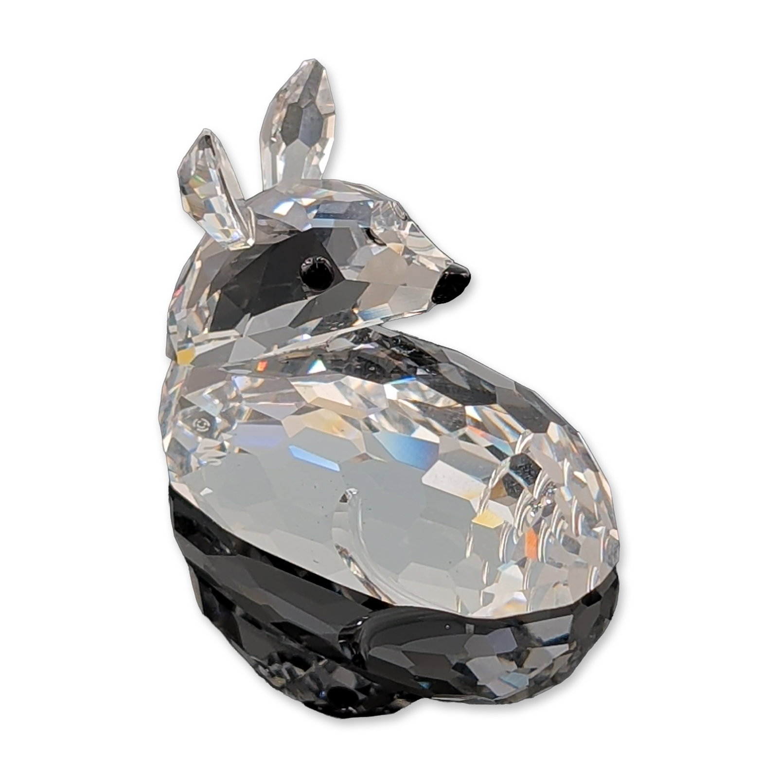 Swarovski Silver Crystal Figurine, Roe Deer Fawn: Swarovski, Austria. Faceted lead crystal figurine of a roe deer fawn from the Silver Crystal Woodland Friends collection, featuring a multi-faceted body, and upright ears. The piece is detailed with b