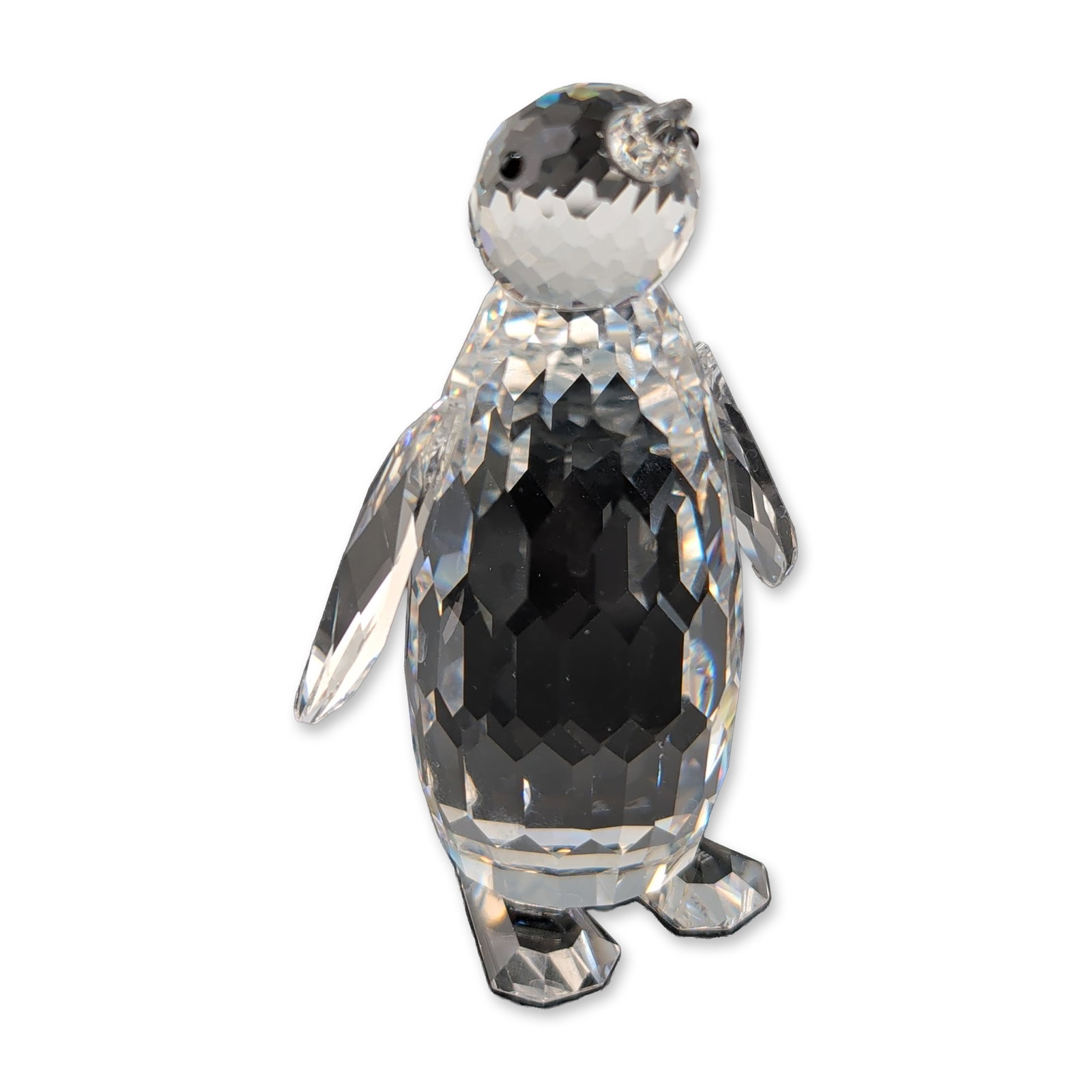 Swarovski Silver Crystal Large Penguin Figurine: Swarovski Silver Crystal large penguin figurine in faceted lead crystal, featuring a faceted body, wings, and head with inset black crystal eyes. The underside of the base features the etched Swarovsk