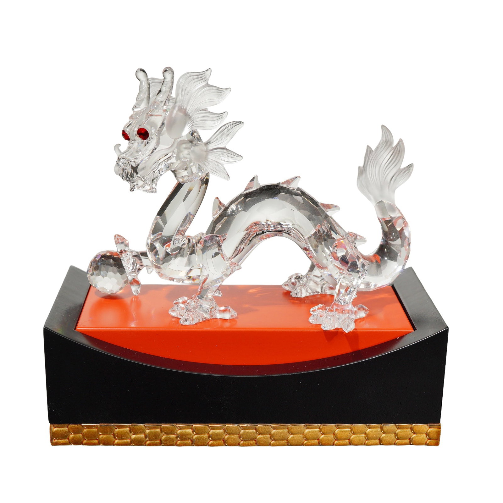 2pc Swarovski Crystal 1997 SCS Annual Edition Figurine, The Dragon with Base: The Dragon crystal figurine is part of the Fabulous Creatures trilogy. The figurine is in faceted and frosted lead crystal, featuring red crystal eyes and a separate faceted crystal sphere. Accompanie
