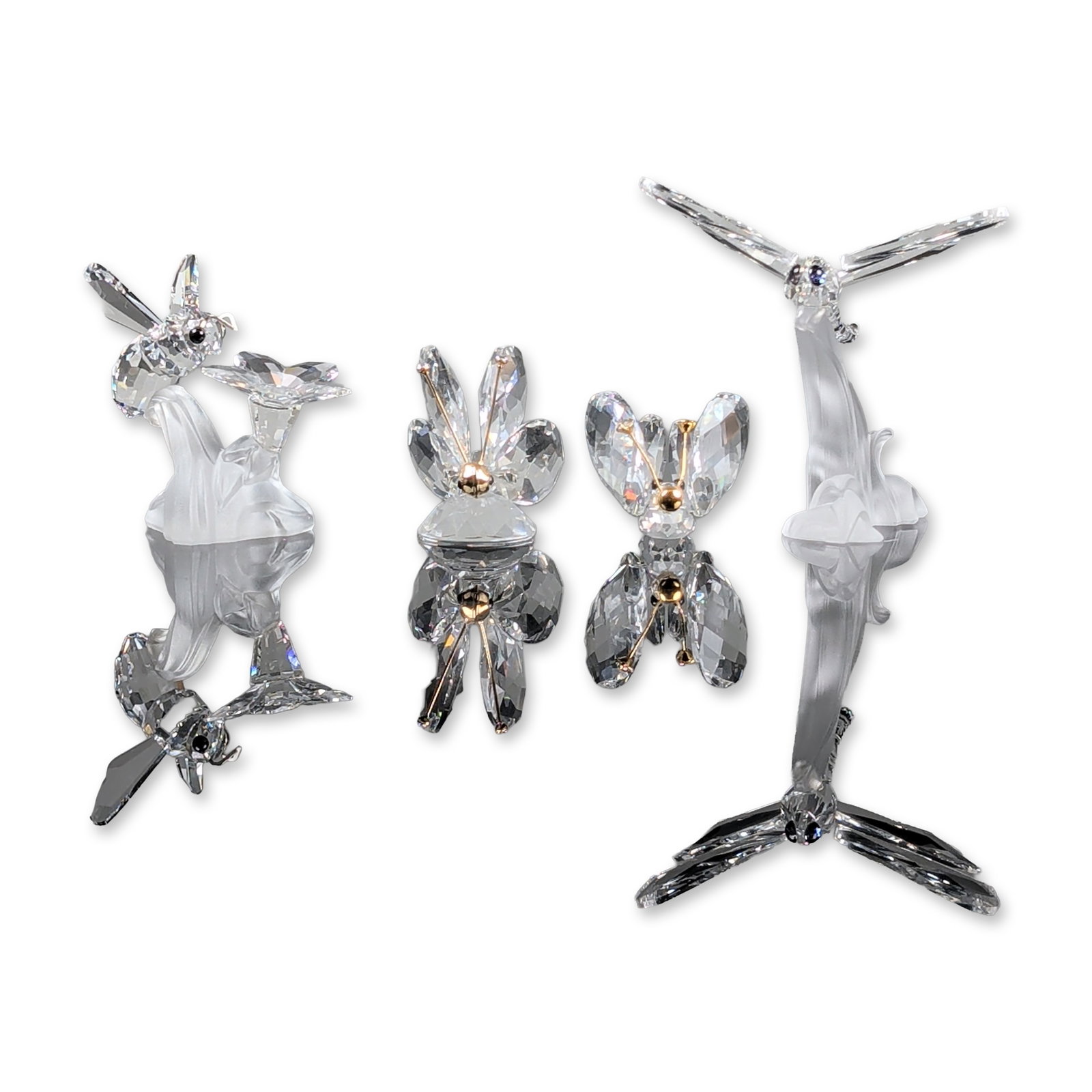 4pc Swarovski Crystal Insect Figurines, Bumblebee, Dragonfly and Butterflies: Swarovski Silver Crystal group of four faceted insect figurines. This collection includes two dragonflies featuring frosted crystal bodies with clear faceted wings and two butterflies with clear facet