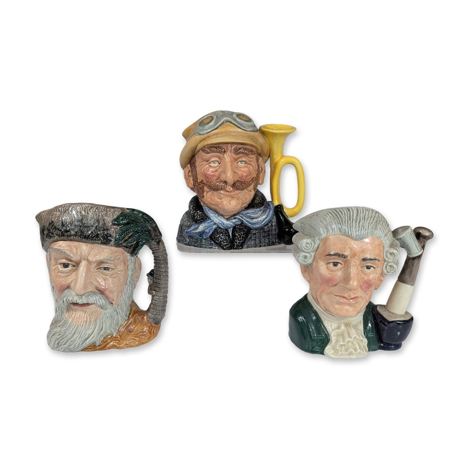 3pc Royal Doulton Ceramic Character Jugs: Trio of large-size Royal Doulton glazed ceramic character jugs manufactured in England. The collection includes The Apothecary (D 6567) from the Williamsburg series, dated 1962, featuring a mortar and