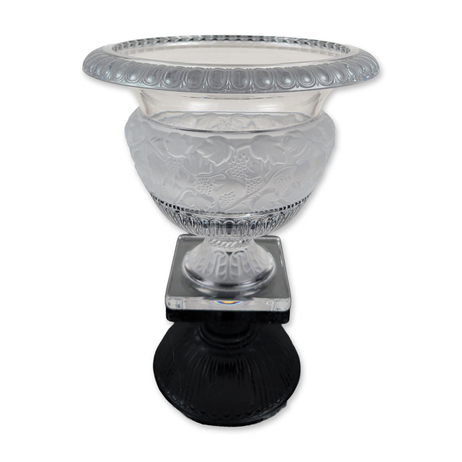 Shannon Crystal by Godinger Large Pedestal Urn Vase, Athena Collection: This crystal pattern vase features a striking combination of clear and frosted finishes, starting with a wide, flared rim adorned with relief-molded ovoid decoration. Below, the central body showcases