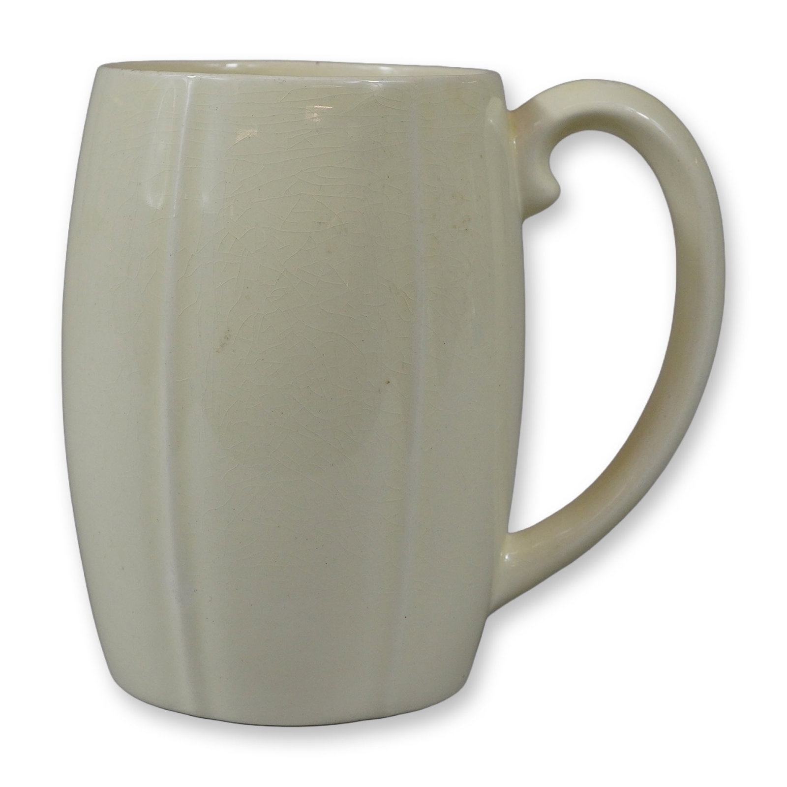 Keith Murray for Wedgwood Barrel Shaped Creamware Mug: This ceramic mug was designed by Keith Murray for the Wedgwood factory in England. The vessel is constructed of earthenware and finished in a monochrome cream colored glaze characteristic of Wedgwood 