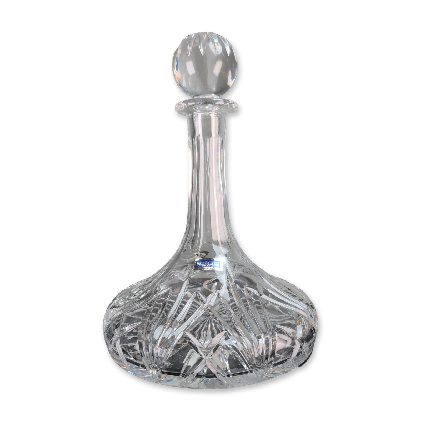 Marquis by Waterford Brookside Crystal Ships Decanter: Marquis by Waterford ships decanter in the Brookside pattern. The lead crystal vessel features a traditional wide-base form designed for stability, with a neck decorated by vertical wedge cuts. The bo