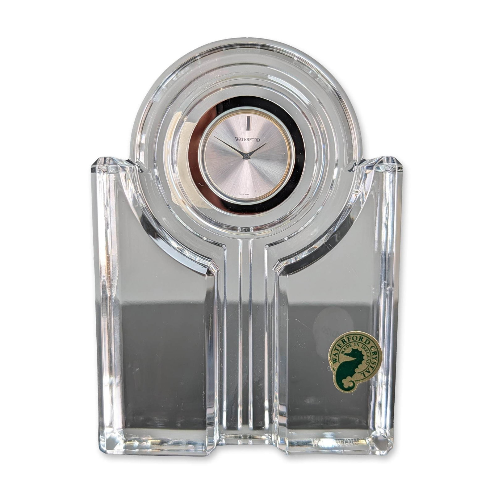 Waterford Keyport Lead Crystal Desk Clock: Waterford Crystal Keyport pattern lead crystal desk clock, featuring a modernist architectural form with a circular upper section and rectangular base with vertical linear accents. The silvered sunbur