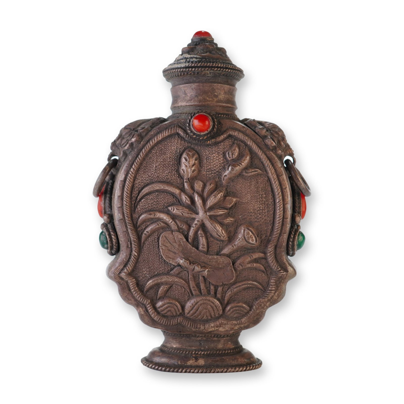 Mongolian Silver Repousse Snuff Bottle, Lotus and Bird: Decorated with coral and malachite stones, this Mongolian silver repousse snuff bottle with stopper features panels showcasing lotus flowers alongside other botanical motifs and birds, accented by lio