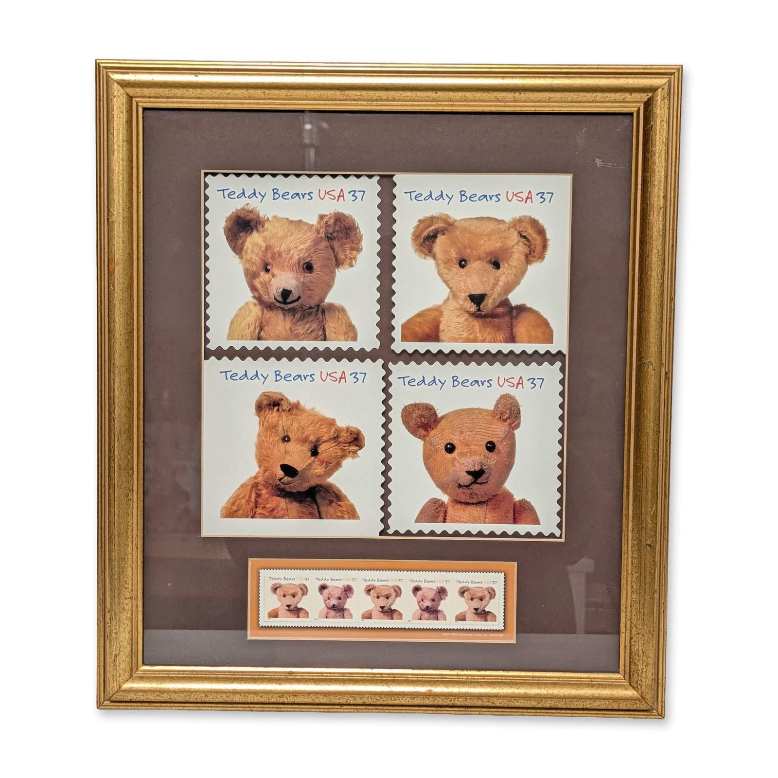 Framed USA 2002 Teddy Bears Commemorative Stamps: US Postal Service framed collection of 2002 Teddy Bear commemorative stamps, featuring a block of four oversized stamps and a vertical strip of four standard stamps. Designs feature four distinct tedd