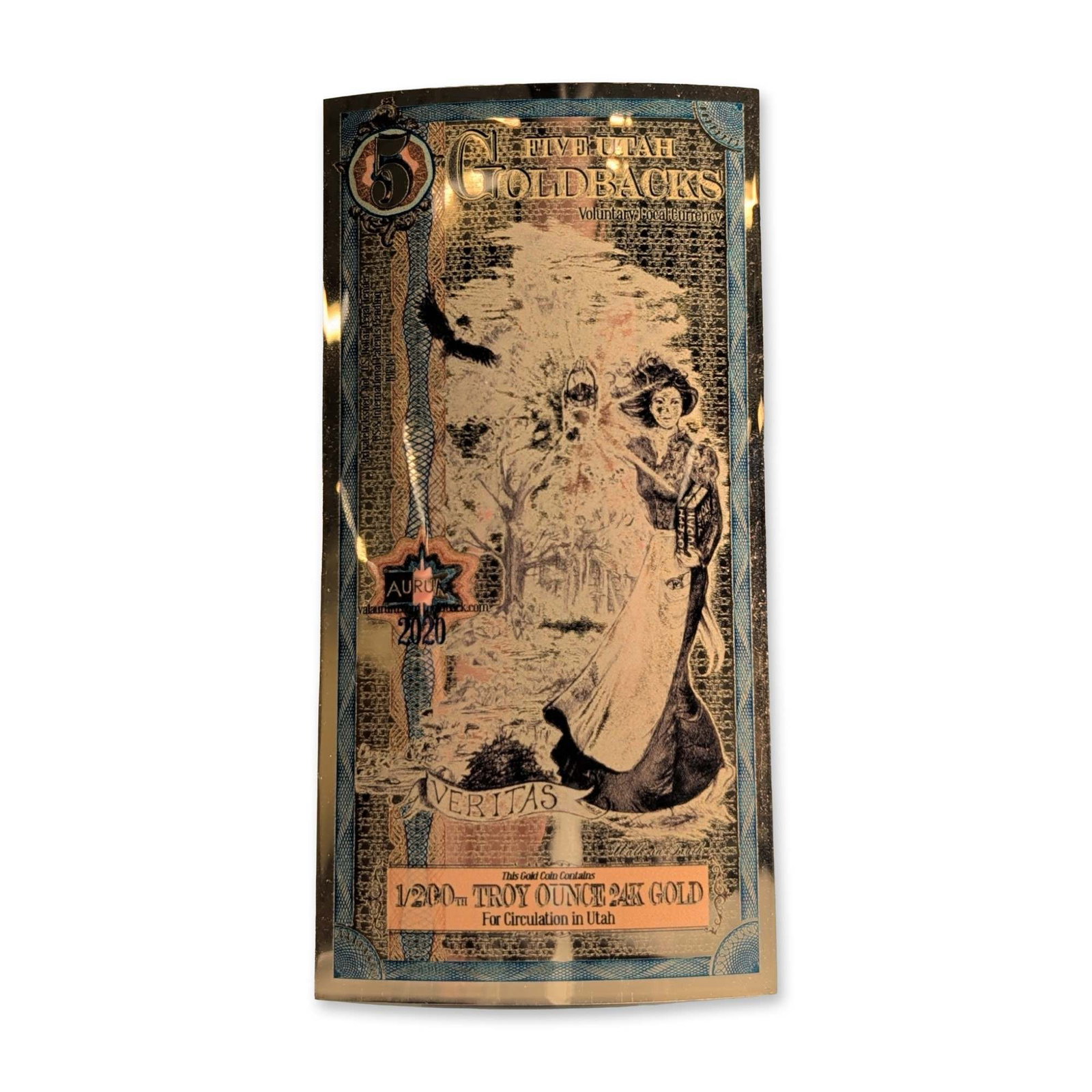 2020 Utah 5 Goldback 24K Gold Foil Note: The obverse features an allegorical vignette of Veritas (Truth) holding a candle in a forest setting with a bird of prey. Inscribed FIVE UTAH GOLDBACKS, Voluntary Local Currency, and 1/200th TROY OUNC