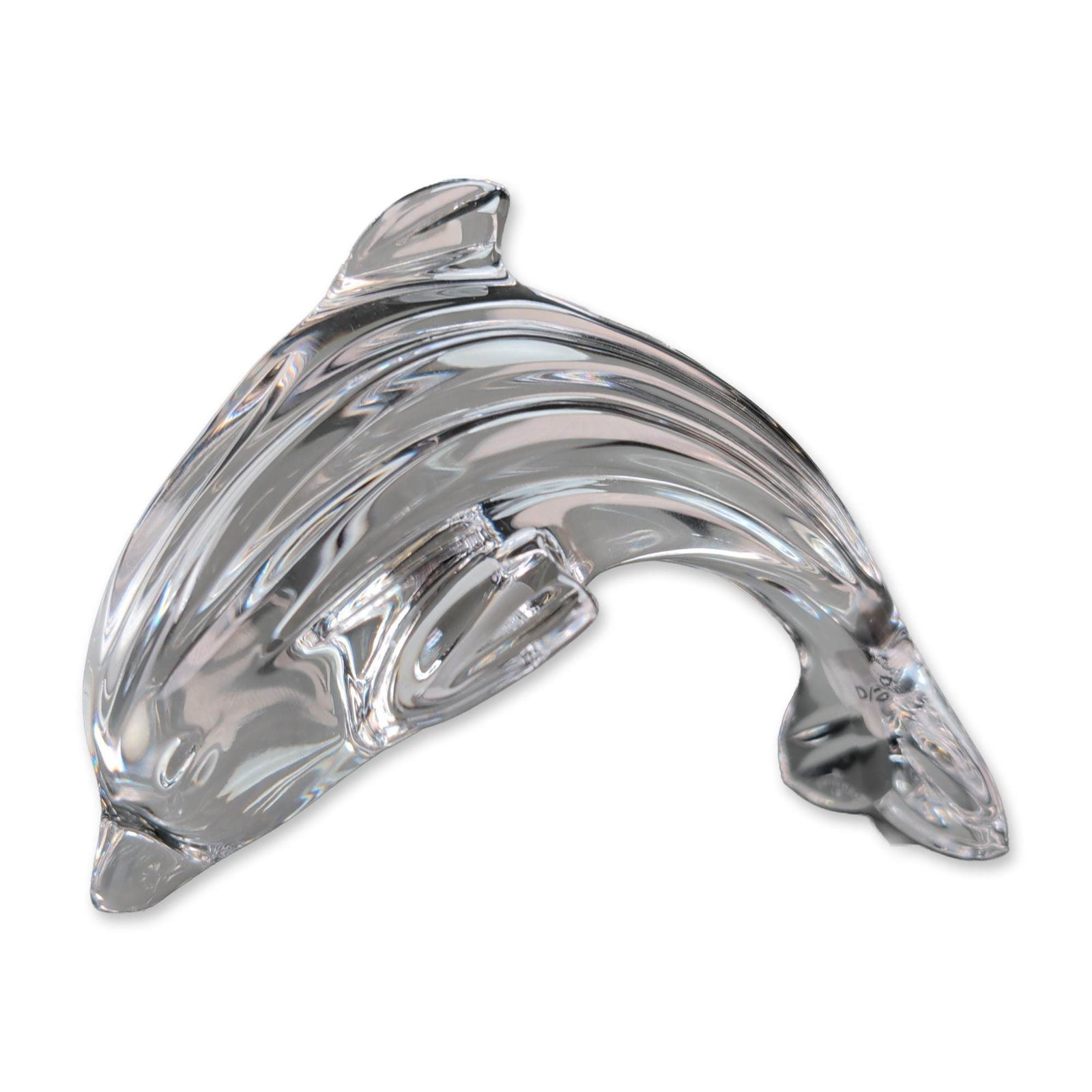 Waterford Crystal Dolphin Figurine: Waterford Crystal dolphin figurine crafted in Ireland from clear lead crystal. The piece features an arched body with linear wedge cuts. Marked with an acid-etched Waterford seahorse logo to the tail 