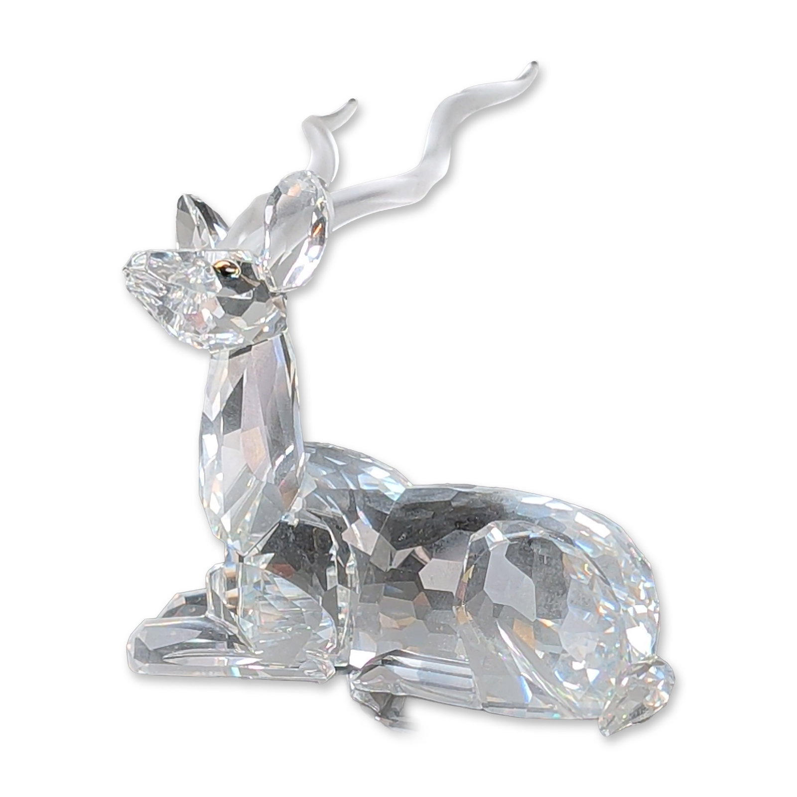 Swarovski Crystal 1994 SCS Annual Edition Figurine, Inspiration Africa Kudu: Swarovski crystal Kudu antelope figurine from the 1994 SCS Annual Edition Inspiration Africa series, designed by Michael Stamey. The figurine is constructed of faceted clear lead crystal with frosted 