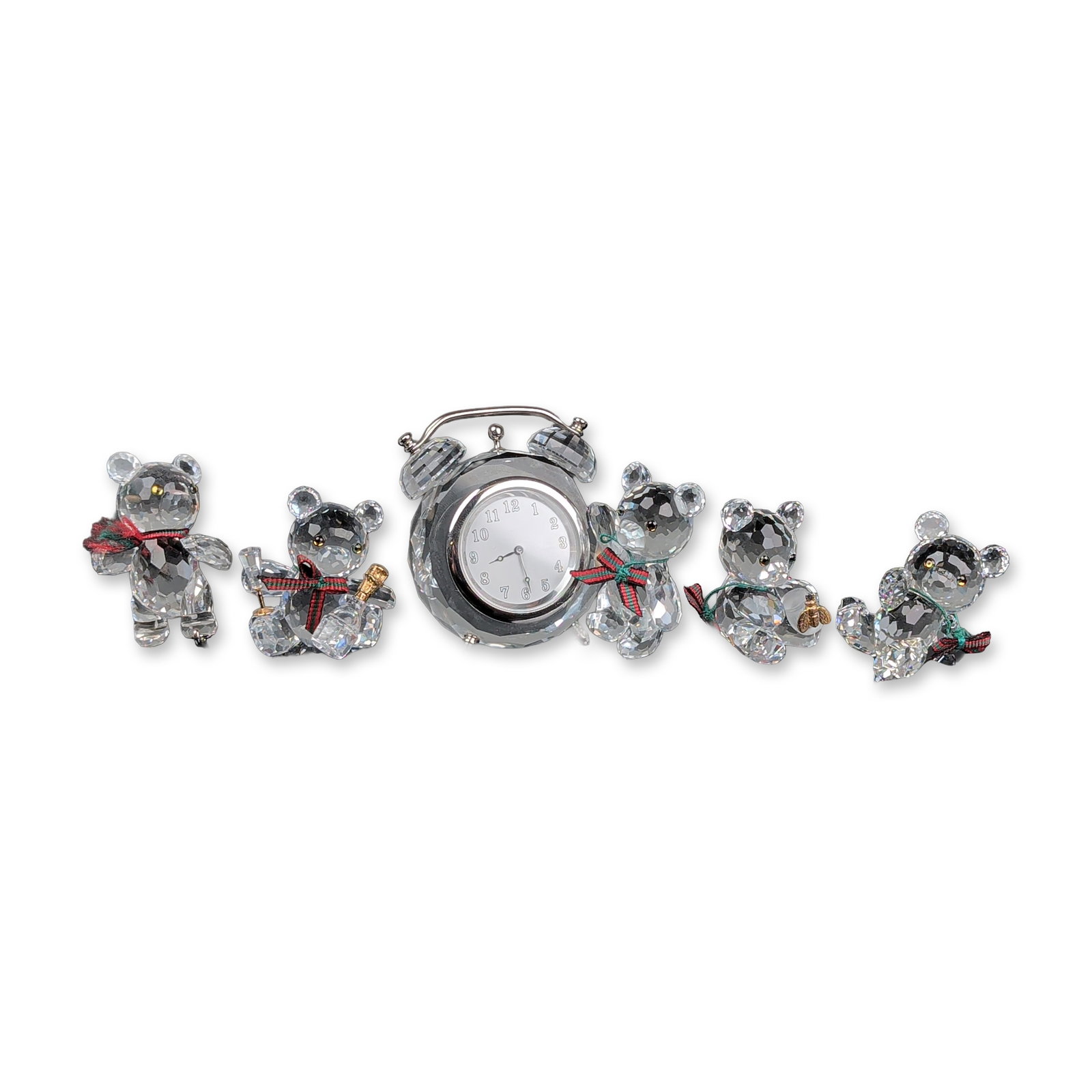 6pc Swarovski Crystal Kris Bear Figurines and Table Clock: Swarovski, Austrian. Group of five faceted lead crystal teddy bear figurines from the Kris Bear series within the Silver Crystal line. The collection features a variety of poses including one bear pos