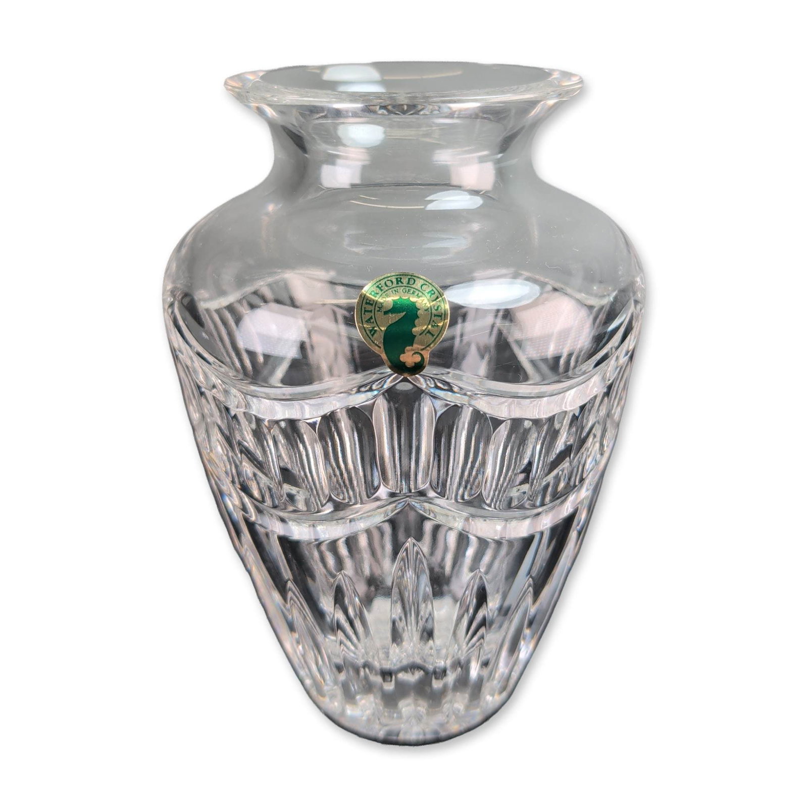 Waterford Pompeii Crystal Vase: Waterford Pompeii lead crystal flower vase. The vessel features a flared rim above a smooth neck, with a body decorated in deep vertical wedge cuts and an arched scalloped band. The lower section is f