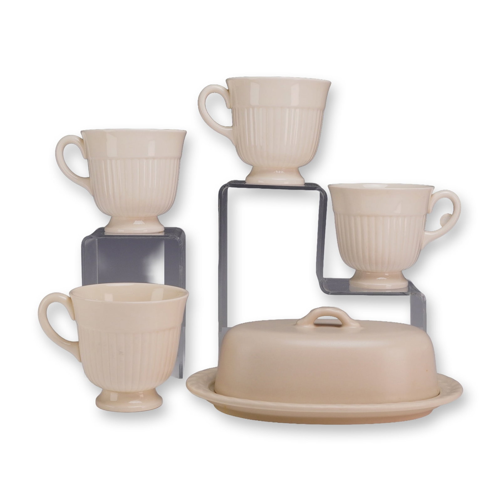 5pc Collection of Wedgwood Ceramic Tableware in Edme and Stone Harbor Patterns: This collection of Wedgwood ceramic tableware features pieces from two distinct production lines. the cups are rendered in the Edme pattern. These cups feature a classical design with vertical fluted 