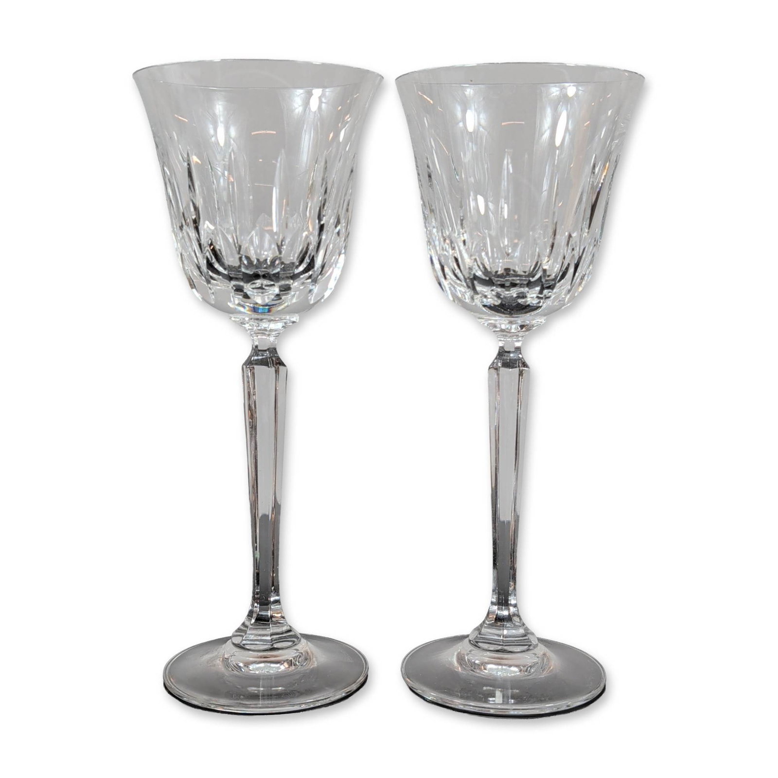 Pair of Mikasa Park Avenue Crystal Water Goblets: Mikasa lead crystal water goblets in the Park Avenue pattern. Each goblet features a bowl decorated with vertical wedge cuts above a band of diamond cutting, supported by a faceted hexagonal stem and 