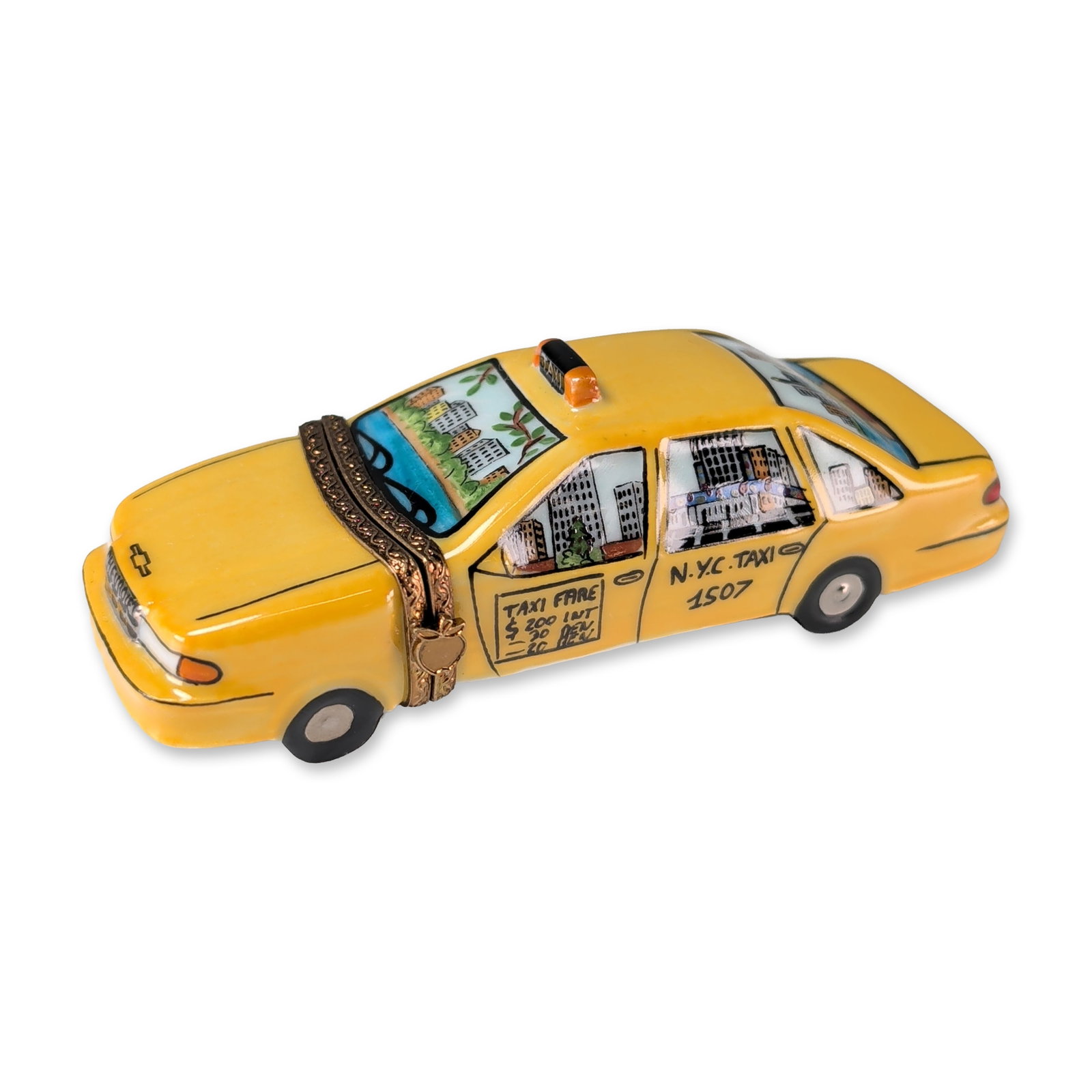 Limoges Peint Main Porcelain New York Taxi Trinket Box: Limoges, France, hand-painted porcelain trinket box modeled as a New York City taxicab. The yellow-ground body is decorated with various hand-painted city scenes including the Manhattan skyline and th