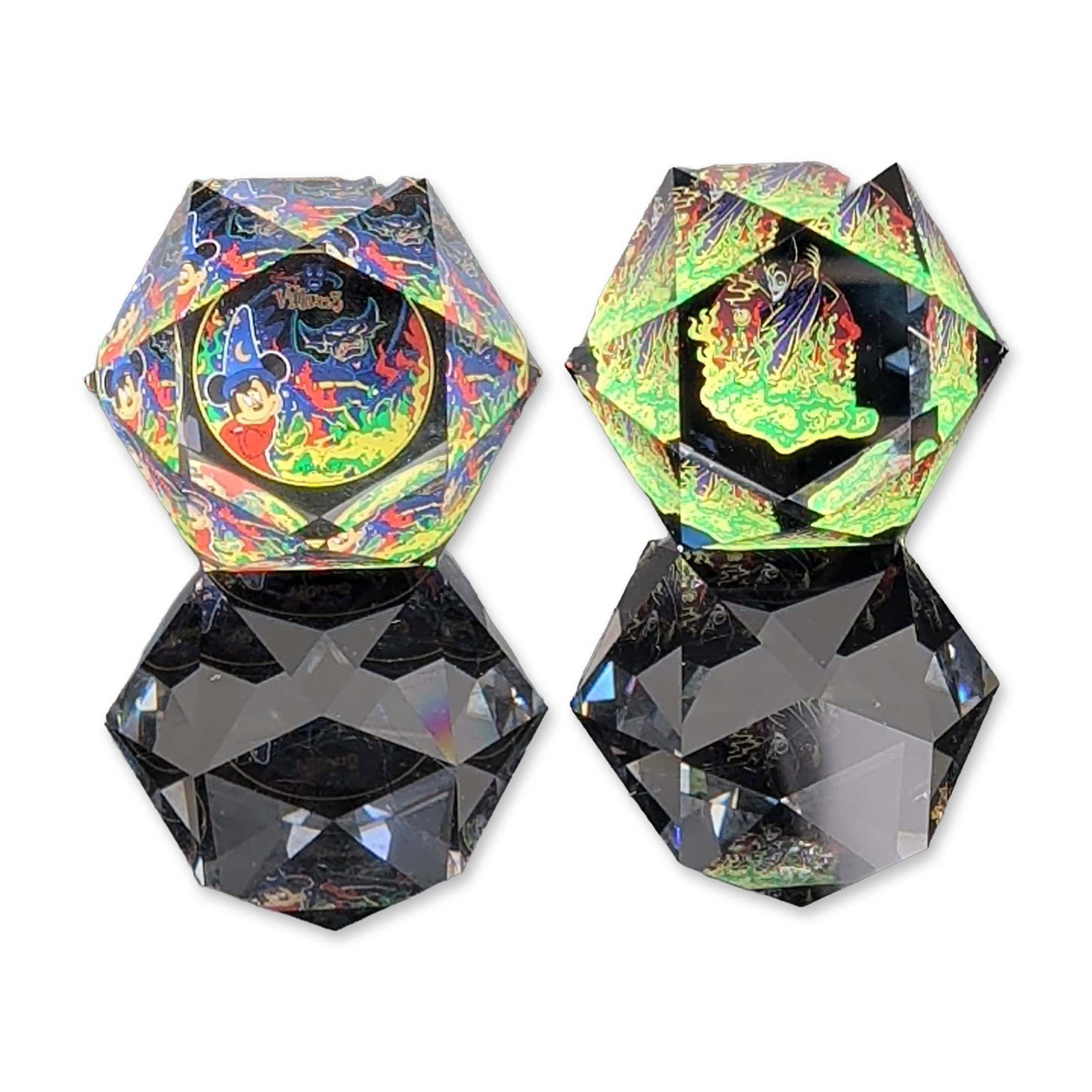 2pc D. Swarovski Arribas Brothers LE Disney Crystal Paperweights: The two faceted lead crystal paperweights from The Arribas Collection. Each 20-sided limited edition, 293 of 750 and 1295 of 1500, icosahedron features internal color imagery, with one depicting Micke