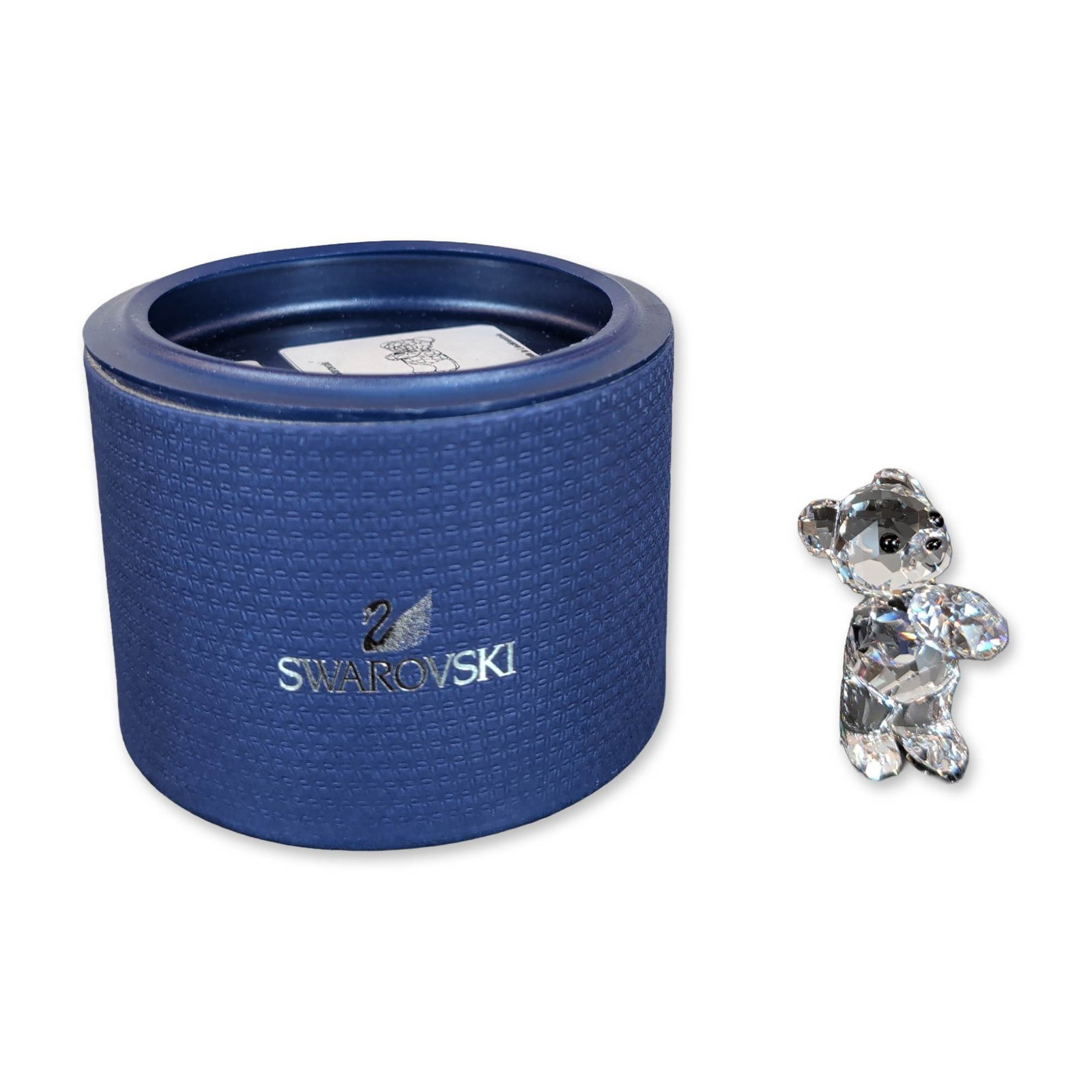 Swarovski 2013 SCS Kris Bear Crystal Figurine: Swarovski 2013 SCS limited edition Kris Bear figurine in faceted clear lead crystal. The figurine features a faceted body with black crystal eyes and nose and presents a crystal chaton engraved with t