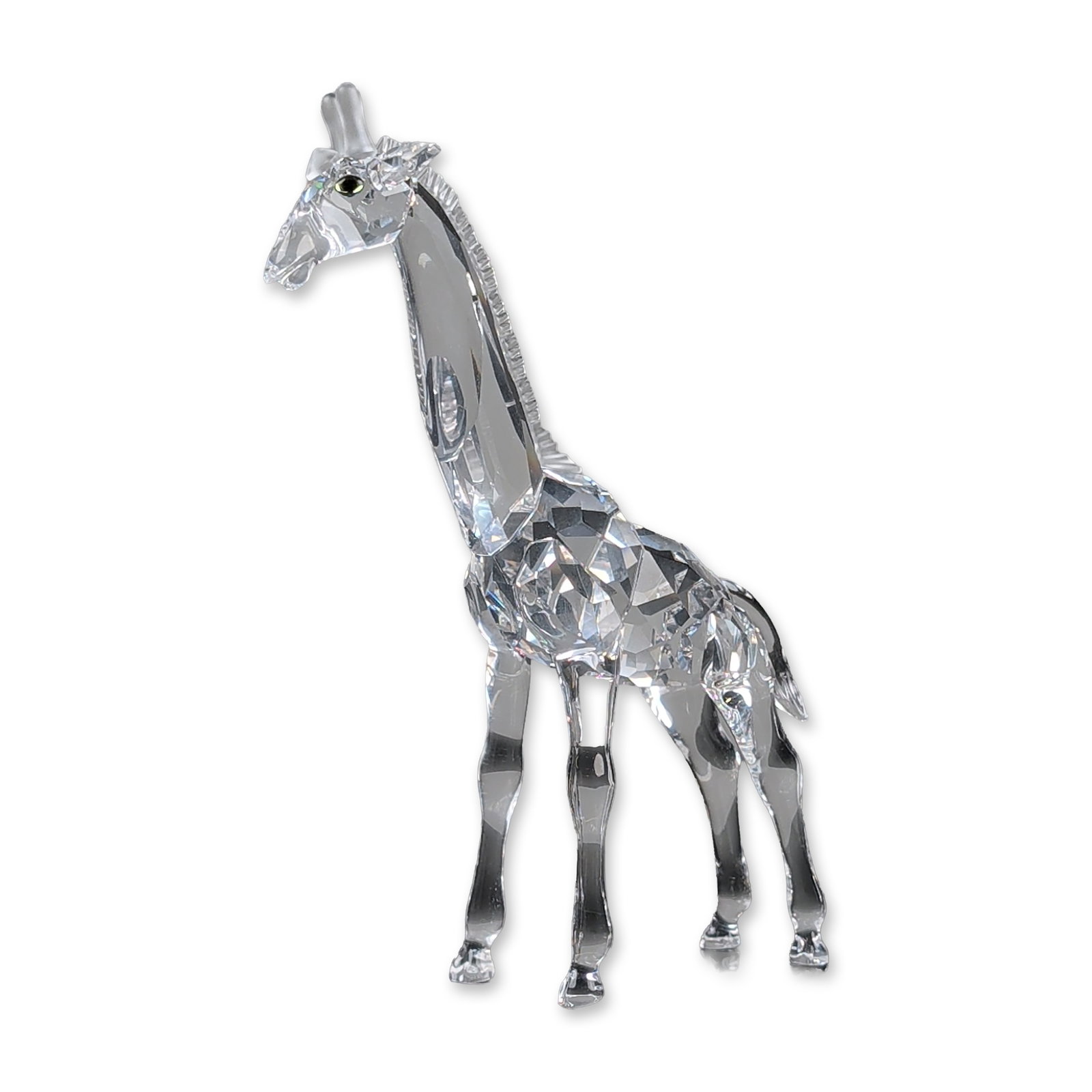 Swarovski African Wildlife Crystal Giraffe Baby Figurine: Swarovski Silver Crystal Giraffe Baby figurine from the African Wildlife series, model number 236717. The piece is constructed from faceted clear lead crystal with a frosted crystal mane and ossicones