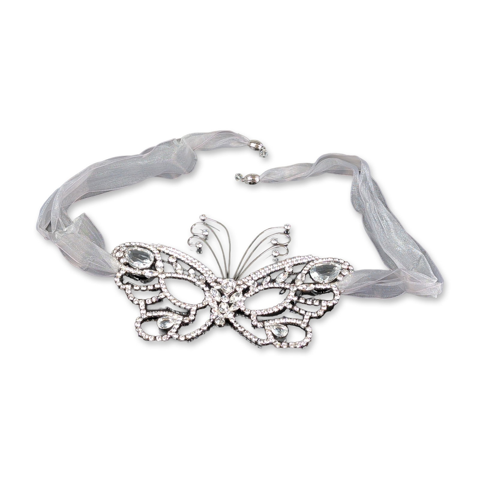 Swarovski Crystal Limited Edition Butterfly Face Mask: 2002 Butterfly-themed masquerade eye mask in silver-toned metal, featuring a dense arrangement of round, marquise, and pear-cut clear crystals. The mask is secured by iridescent sheer white organza ri