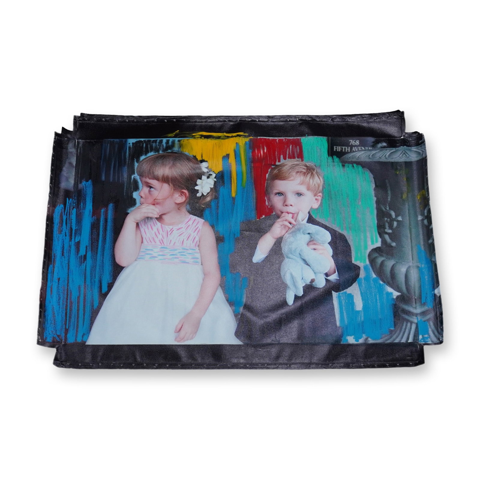 Large Digital Manipulated Print on Unstretched Canvas, Signed: This large digital manipulated print on unstretched canvas depicts two children in formal attire, a girl in a white dress and a boy in a blazer holding a plush rabbit, positioned next to a classical s