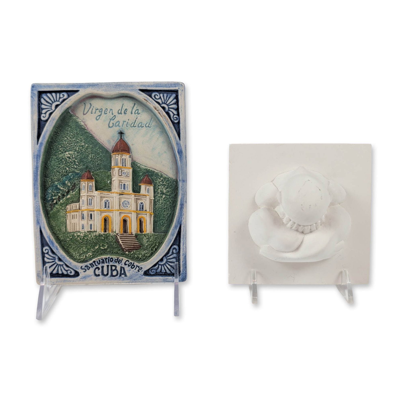 Two Guillon and Imaginoscope Molded Relief Wall Plaques: Two molded relief wall plaques. One hand-painted ceramic plaque depicting the Sanctuary of El Cobre in Cuba, inscribed Virgen de la Caridad, Santuario del Cobre, and CUBA. The reverse features an inci