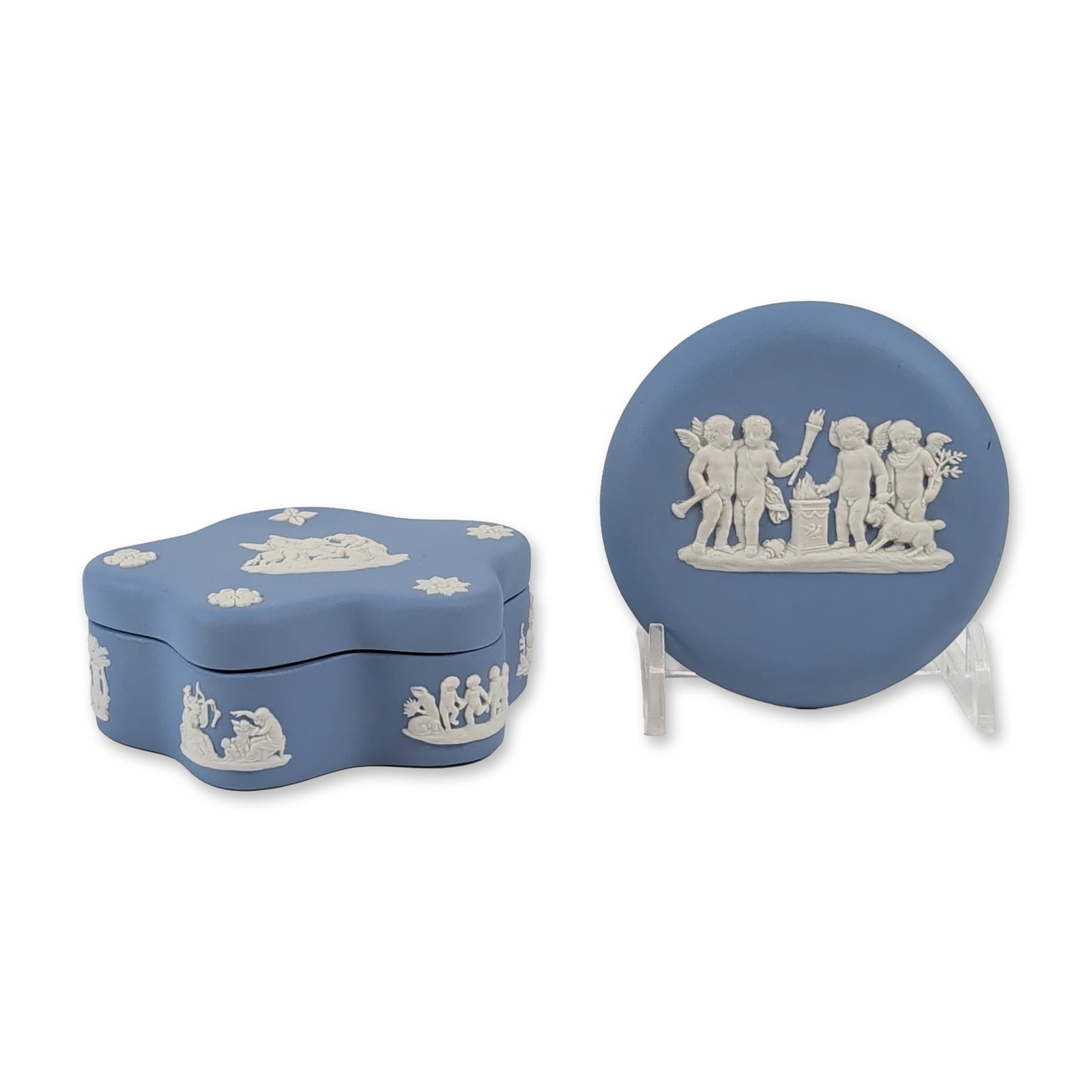 2pc Wedgwood Blue Jasperware Jewelry Box and Medallion: Wedgwood blue jasperware set with white sprigged bas-relief in a neoclassical style. The set includes a quatrefoil jewelry box with a lid showing a central mythological chariot scene framed by floral 