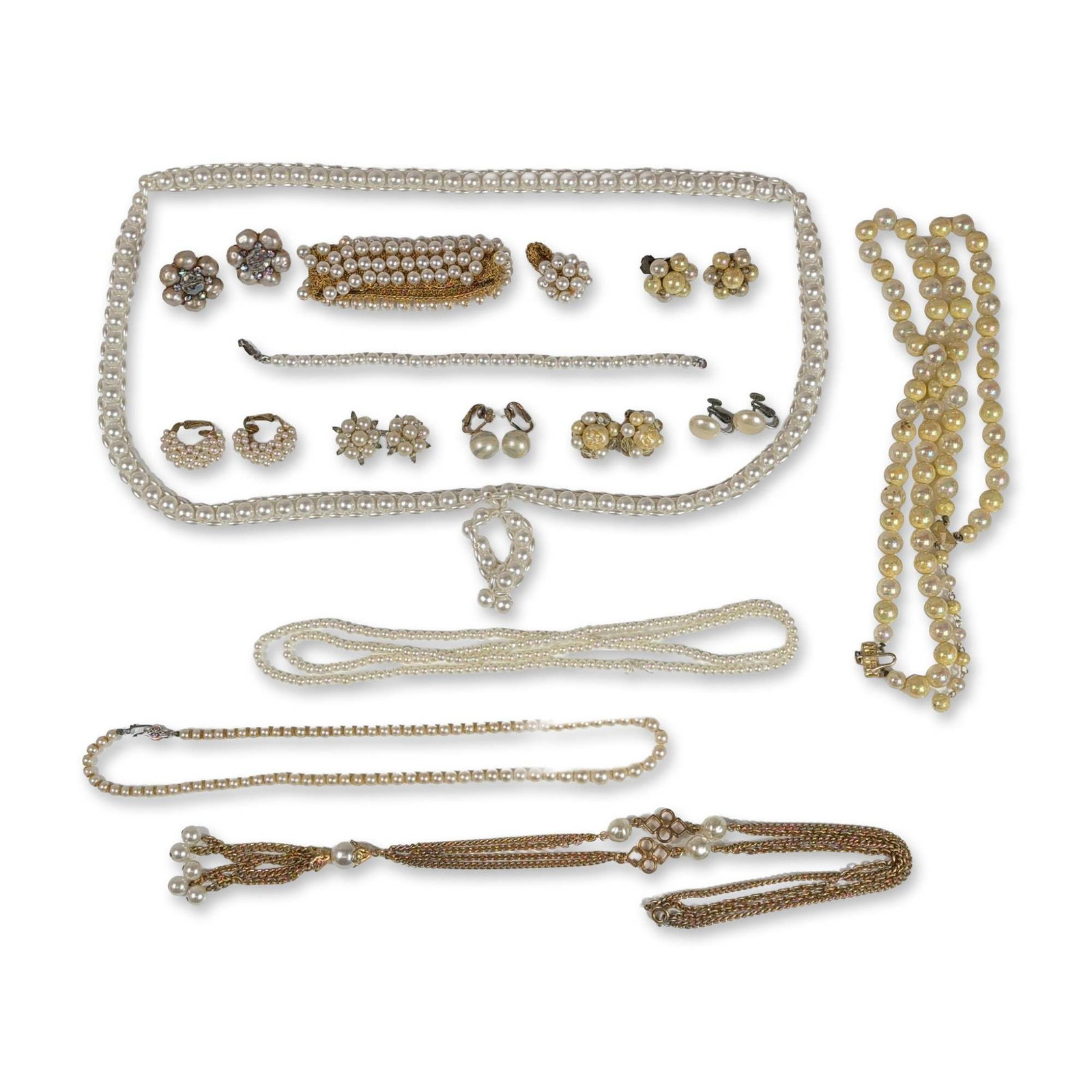 22pc Collection of Vintage Faux Pearl Jewelry: Vintage mid-20th century costume jewelry. Collection in gold-tone and silver-tone base metal featuring faux pearls, rhinestones, and faceted glass beads. The grouping includes a multi-strand chain nec