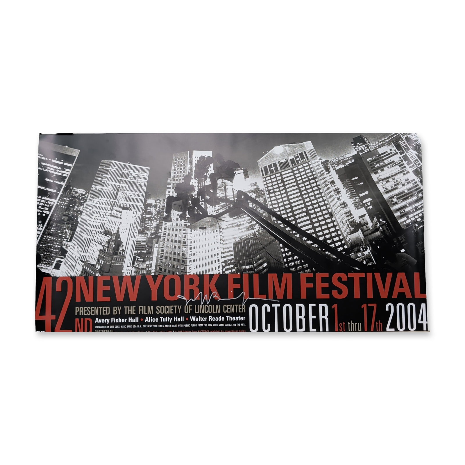 Jeff Bridges Signed 42nd New York Film Festival Poster: 42nd New York Film Festival poster, dated October 1-17, 2004, featuring a photograph by Jeff Bridges. The high-contrast black and white image depicts a film crew on a crane against a New York City sky