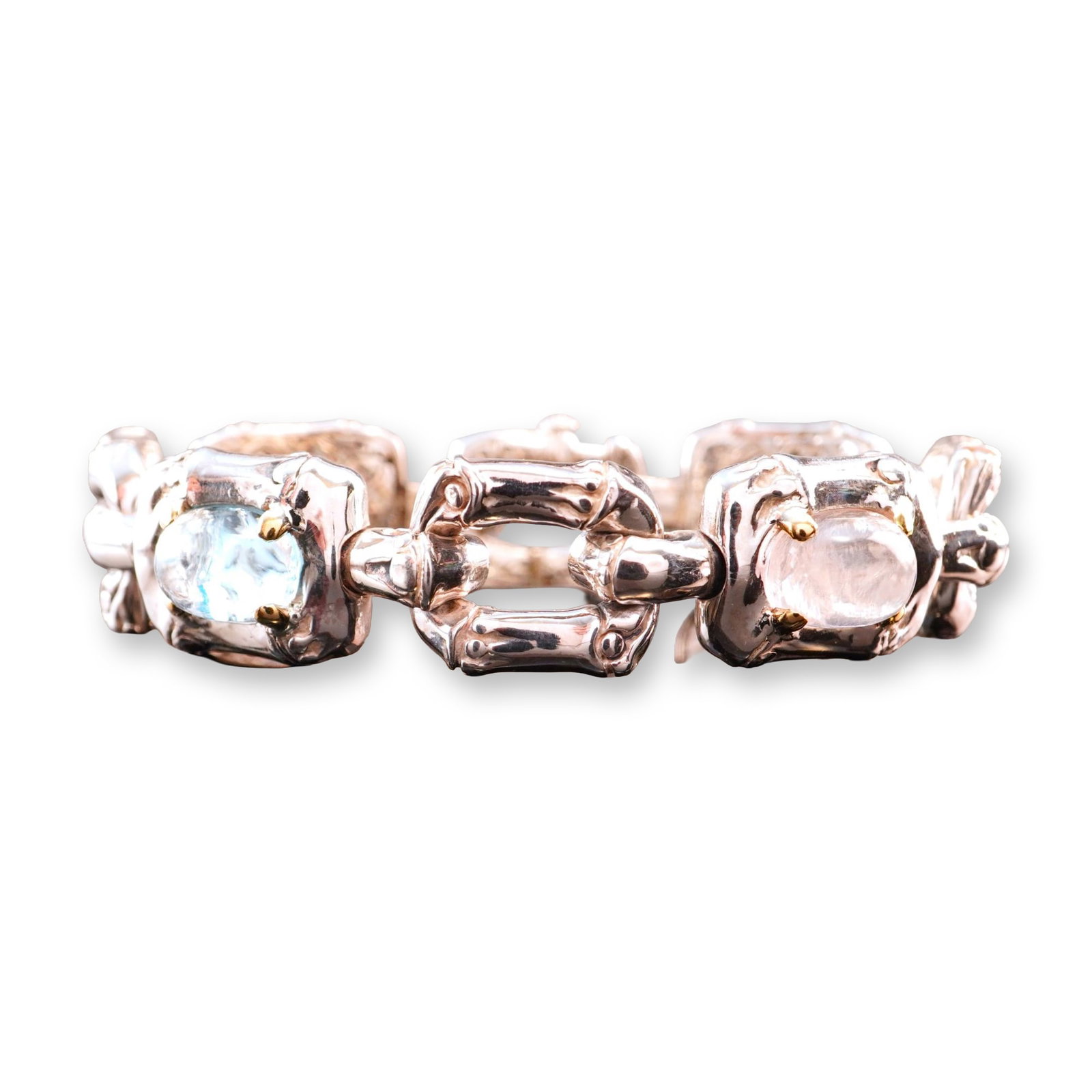 John Hardy Sterling Silver and 18K Yellow Gold Bamboo Link Bracelet with Gemstones: This link bracelet by John Hardy from the Bamboo collection is crafted in sterling silver with 18K yellow gold accents. The design features four large oval cabochon-cut gemstones in alternating colors