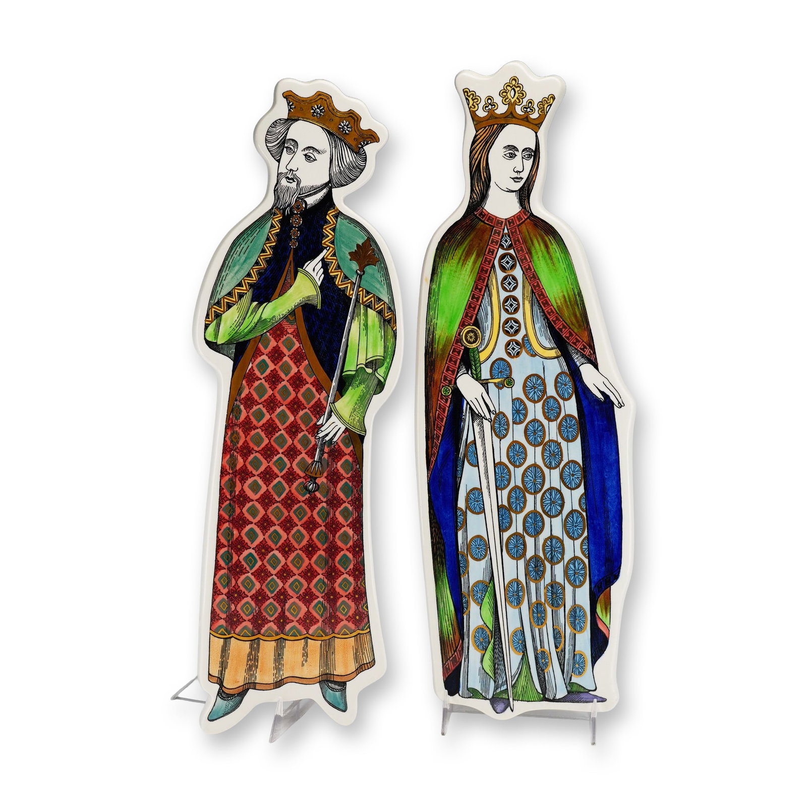 A Pair of Wedgwood of Etruria and Barlaston Medieval King and Queen Ceramic Wall Plaques: This pair of molded earthenware wall plaques are shaped as the silhouette of a King and Queen, reflecting a mid-century modern interpretation of medieval style. Each piece is decorated with hand-paint