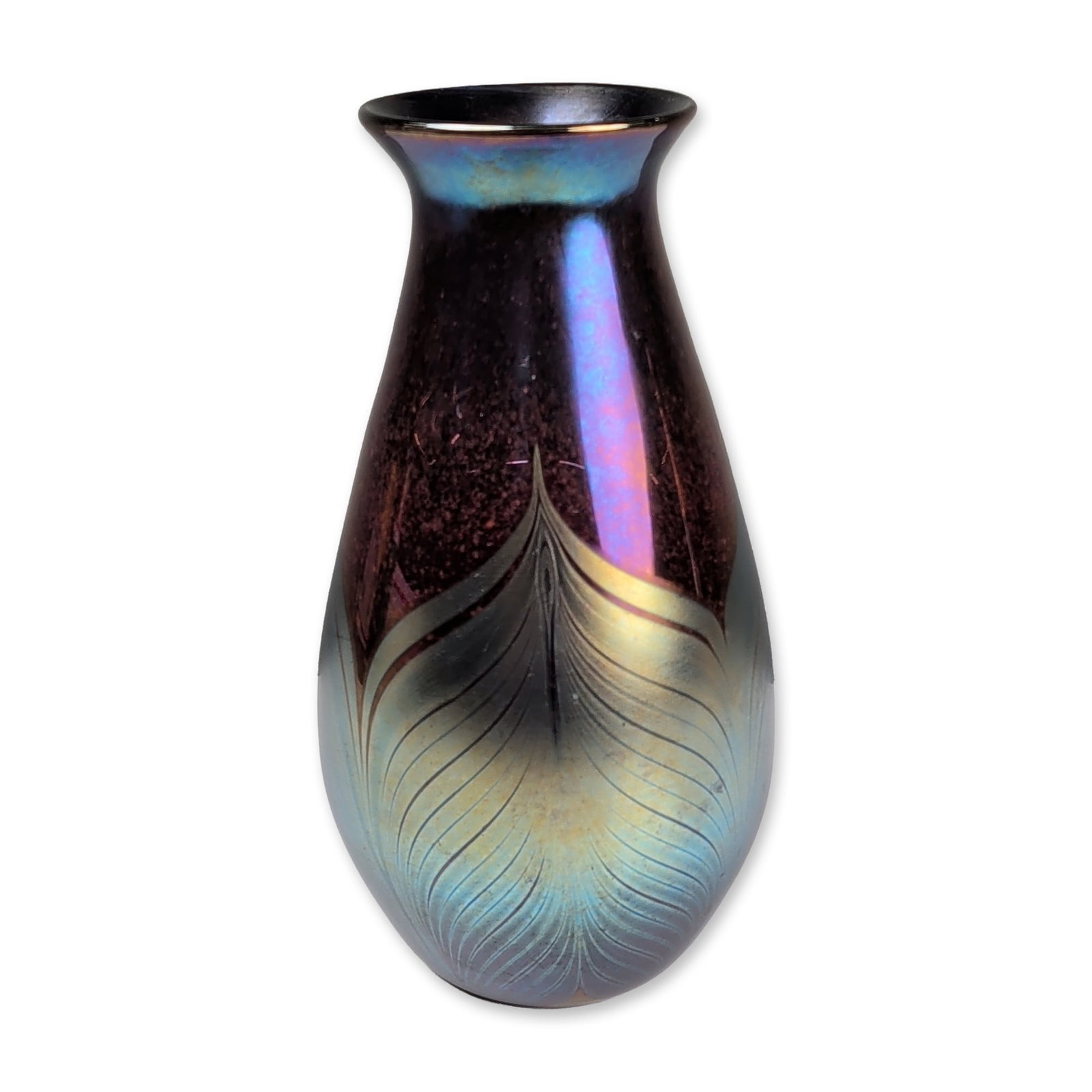 John Barber Iridescent Pulled Feather Art Glass Vase, Signed: Hand-blown iridescent art glass vase of ovoid form with a flared neck. The body is composed of deep amethyst-purple glass that reveals a ruby-red glow under transmitted light, decorated with a pulled-