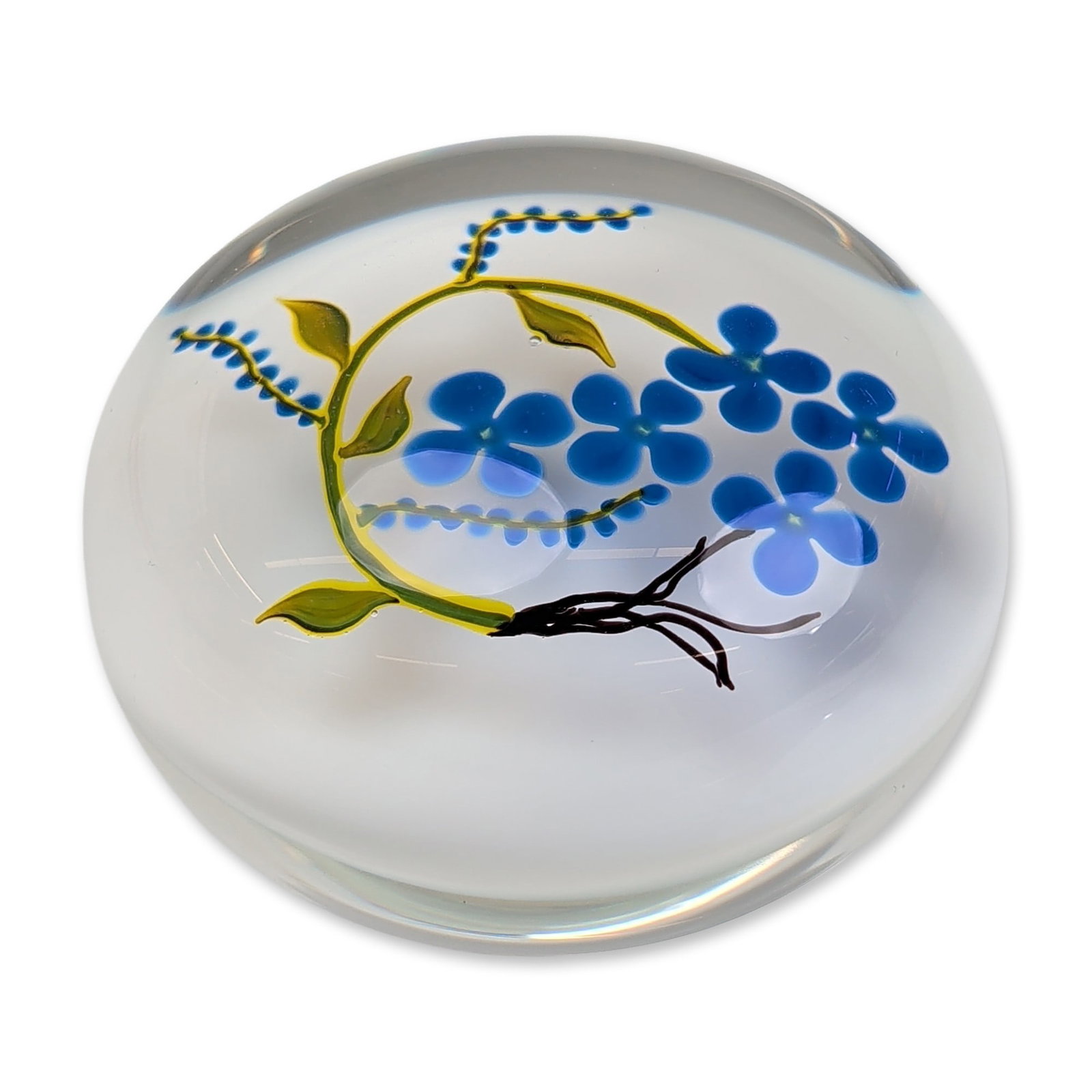 Paul J. Stankard 1975 Forget-Me-Not Glass Paperweight: Paul J. Stankard (American, b. 1943). Lampwork paperweight, dated 1975. The internal composition features five blue forget-me-not blossoms on a curving yellow-green stem with four green leaves and thr
